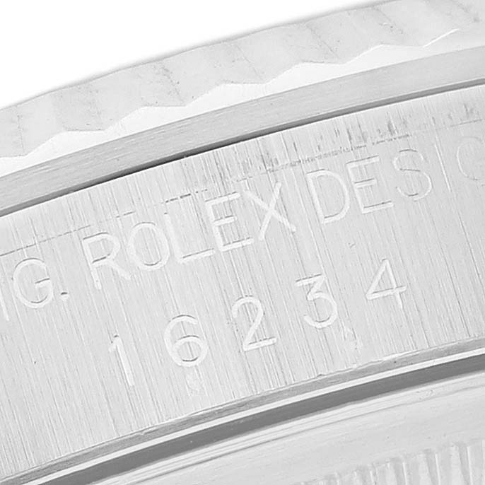 The image shows a close-up angle of the model number engraving on the bezel of a Rolex Datejust 16234 Men's Stainless Steel Silver Dial 16234 Men's Stainless Steel Silver Dial watch.