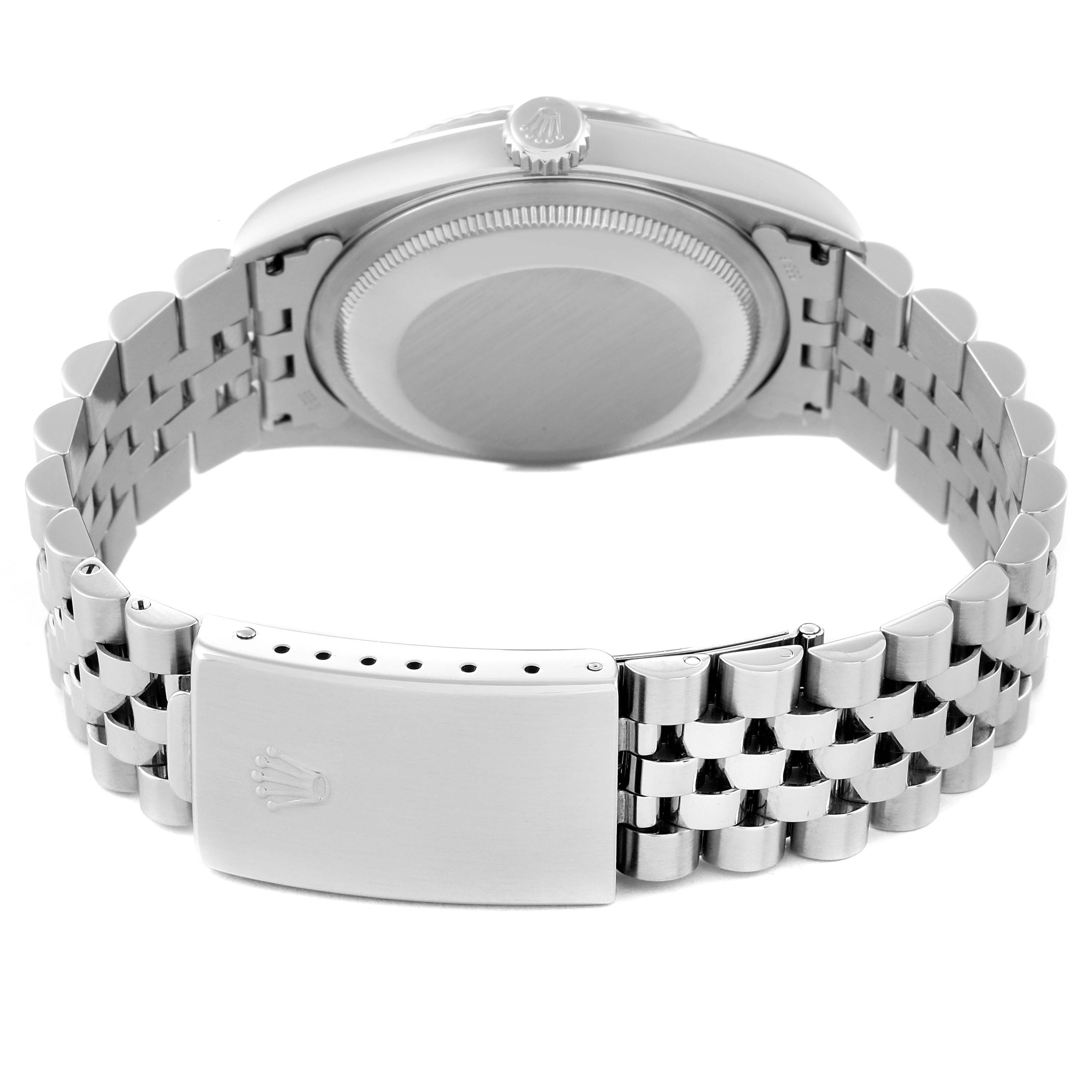 This is the back view of a Rolex Datejust 16234 Men's Stainless Steel Silver Dial 16234 Men's Stainless Steel Silver Dial watch, showing the case back and Jubilee bracelet with a clasp.