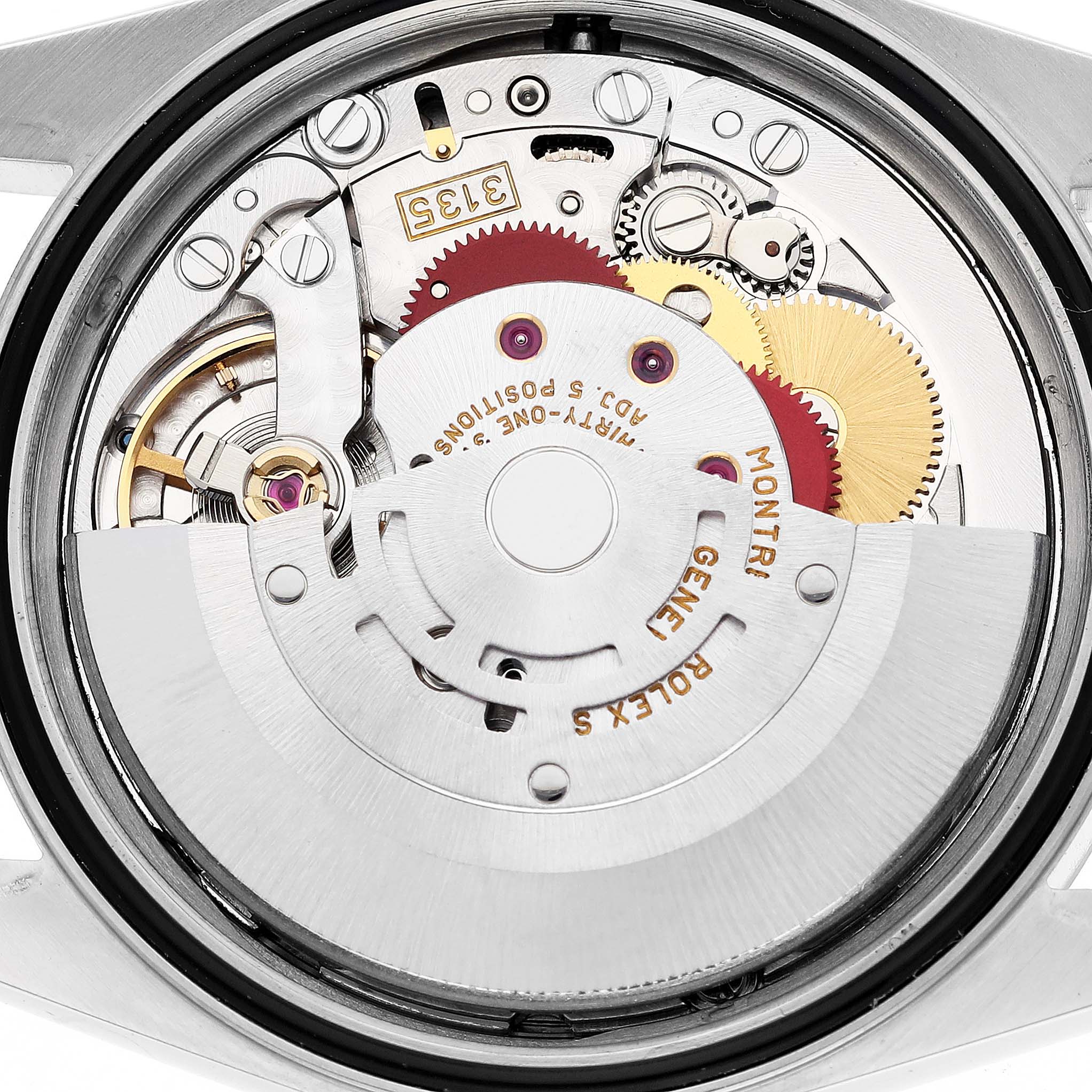 The image shows the inner mechanical movement of a Rolex Datejust 16234 Men's Stainless Steel Silver Dial 16234 Men's Stainless Steel Silver Dial watch, highlighting gears and components.