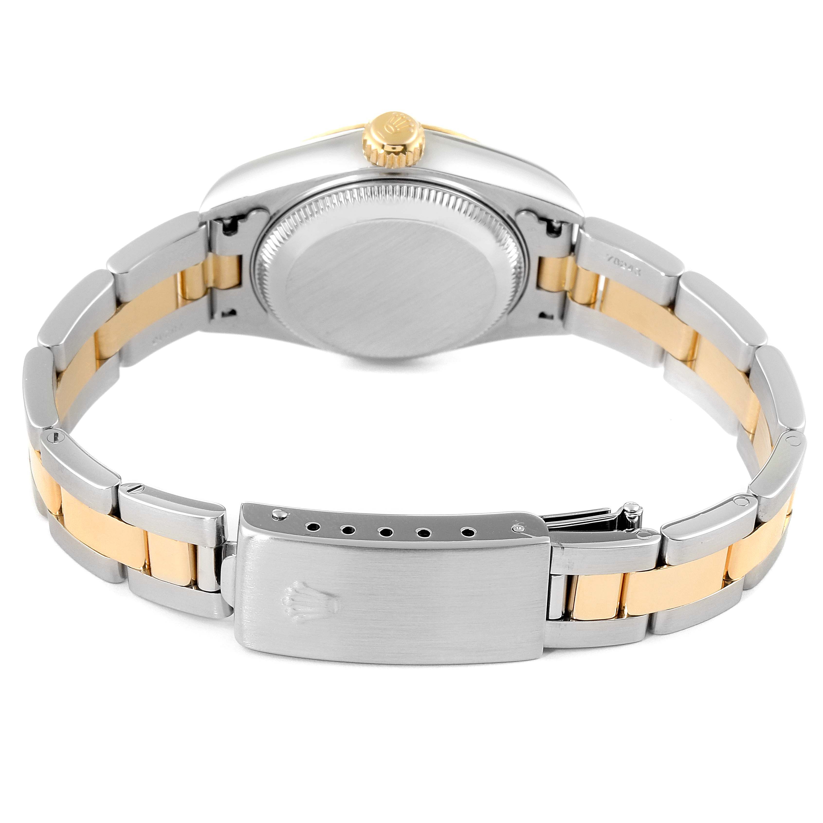 The image shows the back view of a Rolex Datejust 79173 Women
s Steel and Gold (two tone) Beige Dial 79173 Women
s Steel and Gold (two tone) Beige Dial watch, highlighting its two-tone bracelet, clasp, and case back.