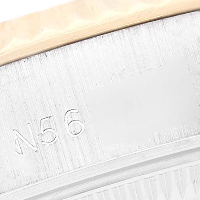 The image shows a close-up of the side of the case, flange, and bezel of a Rolex Datejust 69173 Women's Steel and Gold (two tone) Champagne Dial 69173 Women's Steel and Gold (two tone) Champagne Dial watch, displaying its engravings.