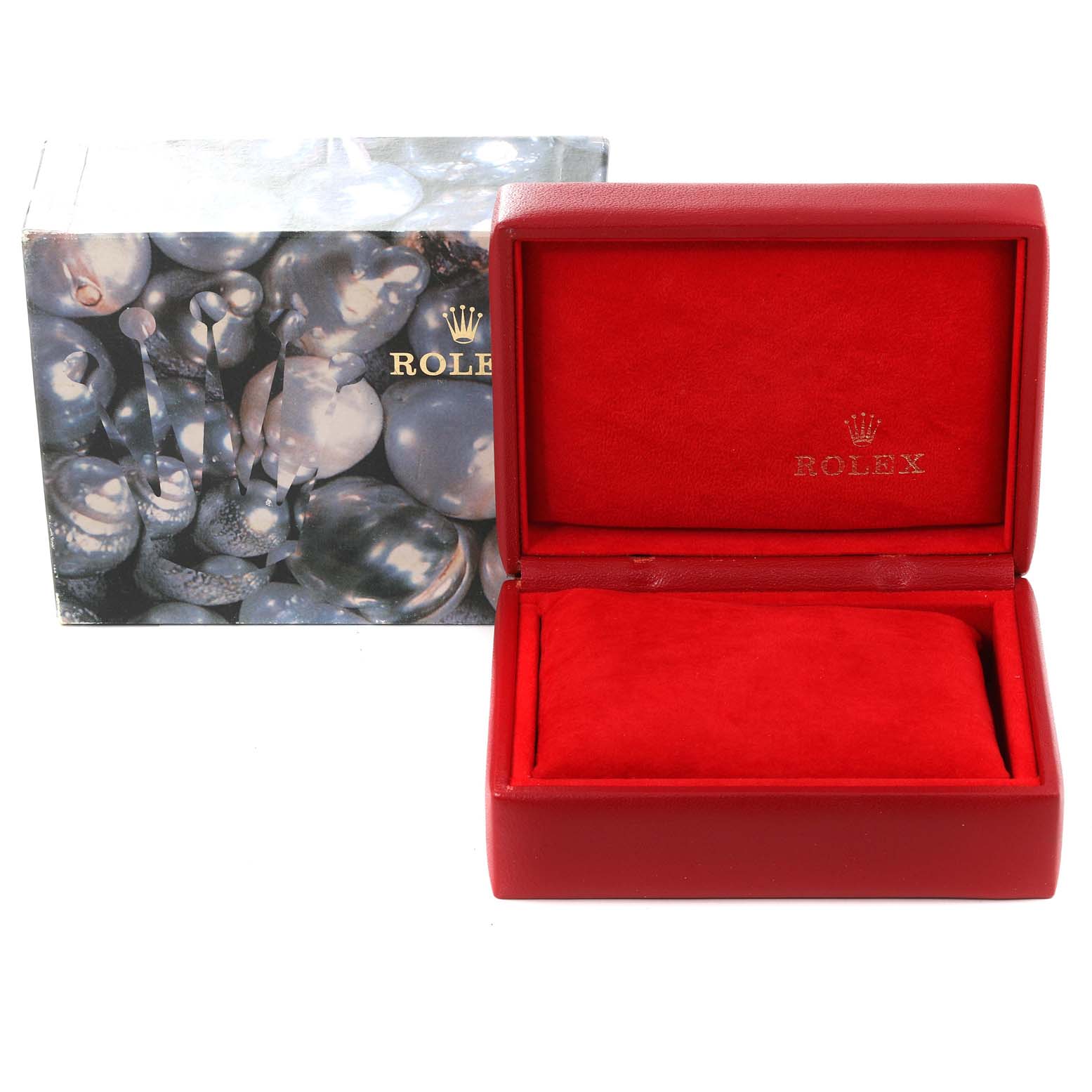 This image shows a red Rolex watch box for the Datejust model with the outer packaging beside it.