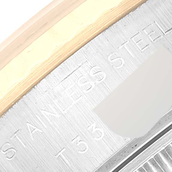 This close-up image shows the side of the bezel and engraved text on the stainless steel case of the Rolex Datejust 69173 Women's Steel and Gold (two tone) Champagne Dial 69173 Women's Steel and Gold (two tone) Champagne Dial watch.