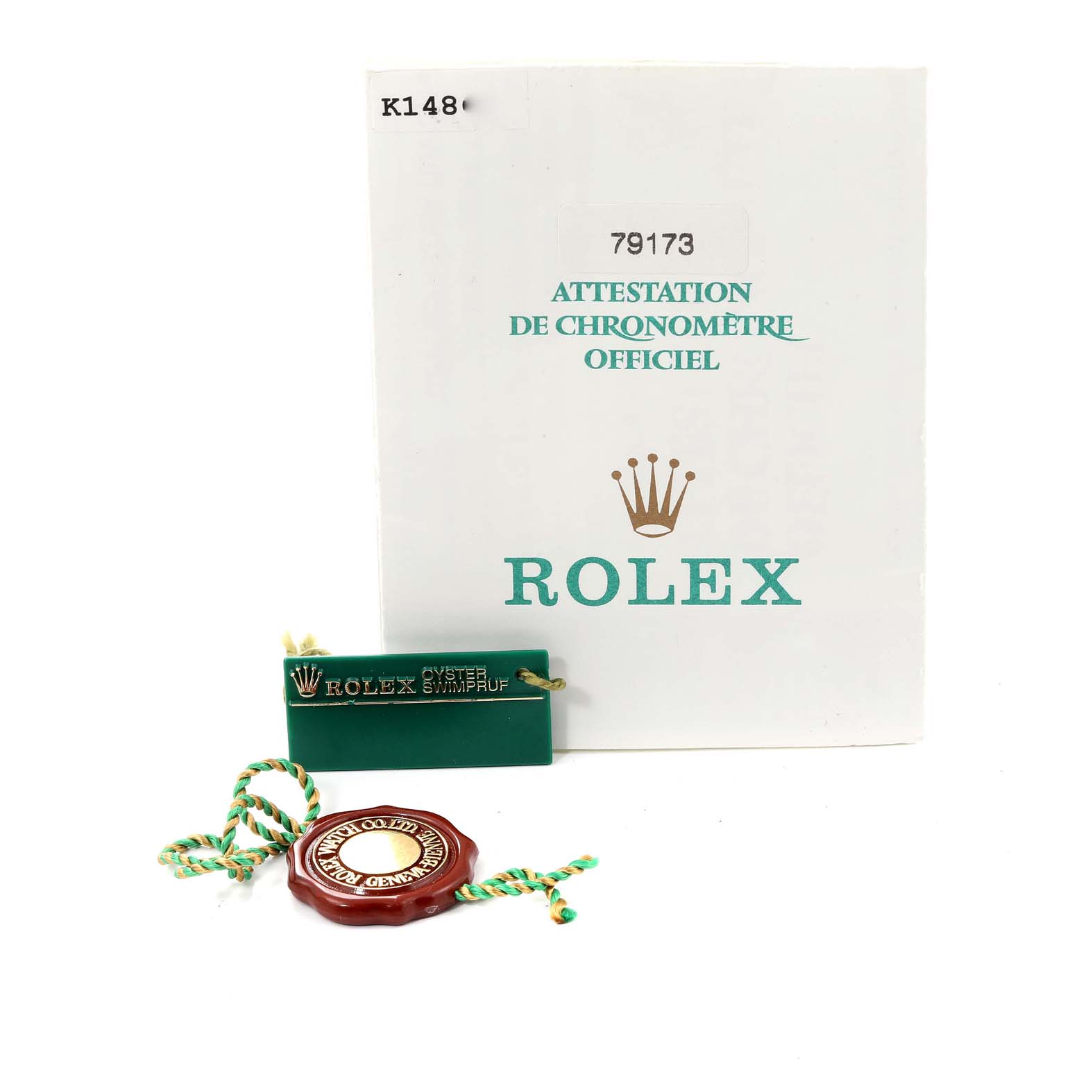 The image shows official documentation and tags for the Rolex Datejust 79173 Women's Steel and Gold (two tone) Champagne Dial 79173 Women's Steel and Gold (two tone) Champagne Dial model.