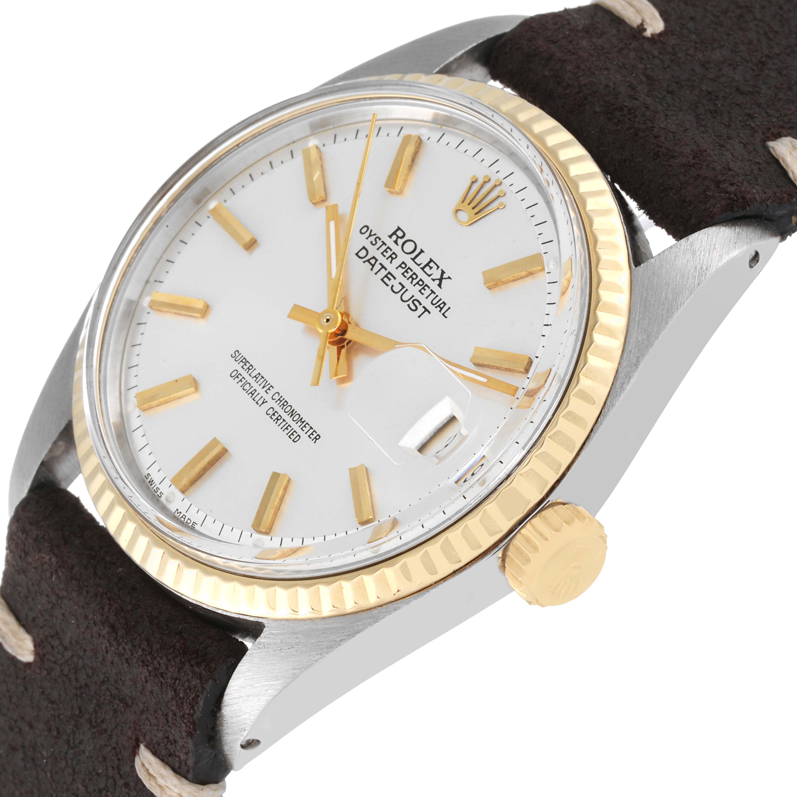 This image shows a close-up, angled view of a Rolex Vintage Collection 1601 Men's Steel and Gold (two tone) Silver Dial 1601 Men's Steel and Gold (two tone) Silver Dial Datejust watch face and crown with a leather strap.