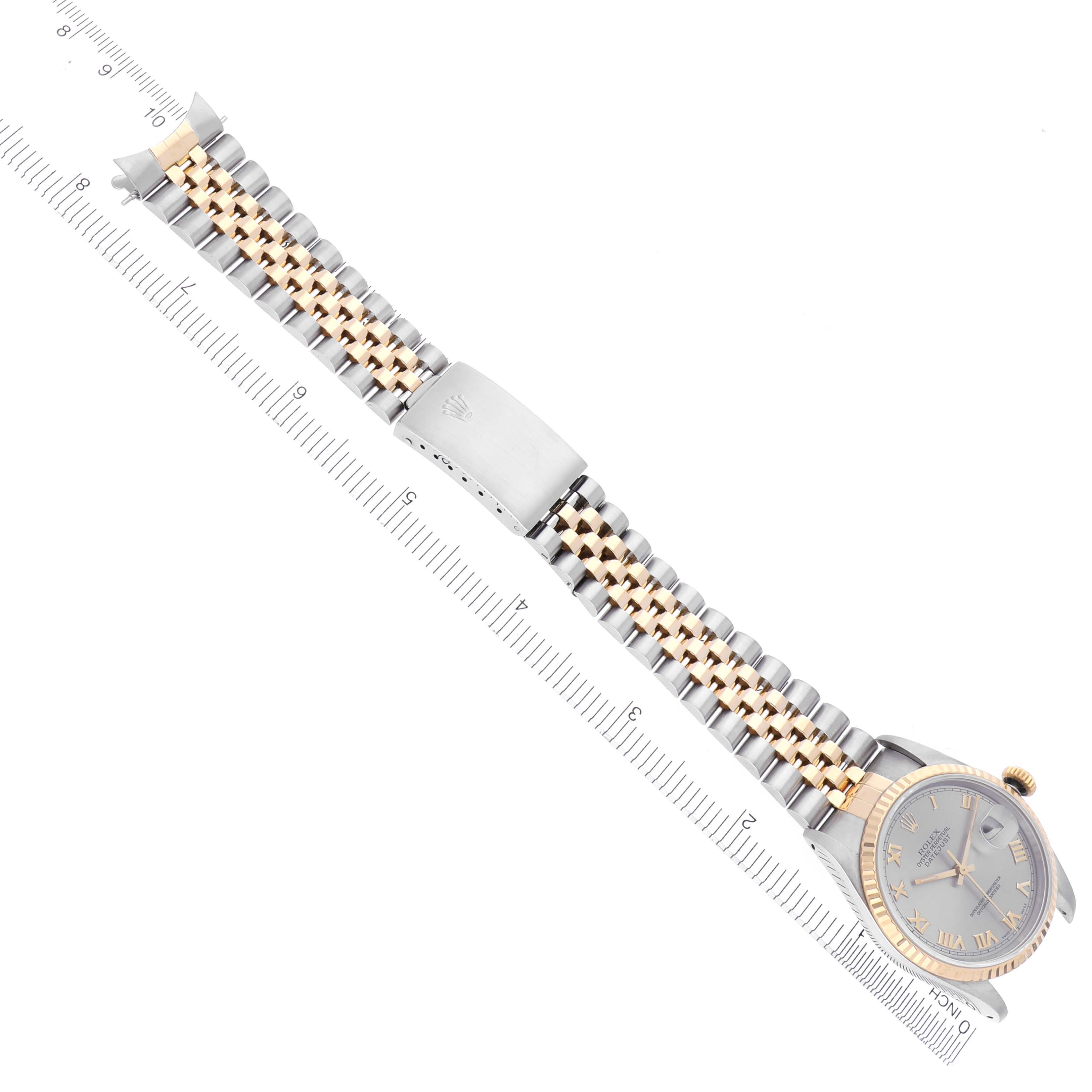 The Rolex Datejust 16233 Men's Steel and Gold (two tone) Grey Dial 16233 Men's Steel and Gold (two tone) Grey Dial watch is shown from a top view, displaying the face, bracelet, and clasp.