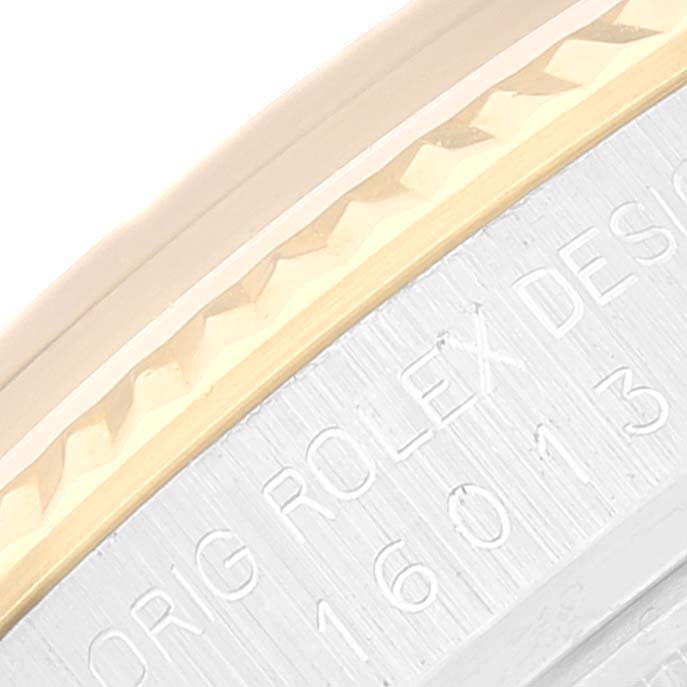 The image shows a close-up of the case edge and part of the bezel on a Rolex Datejust 16013 Men's Steel and Gold (two tone) White Dial 16013 Men's Steel and Gold (two tone) White Dial watch.