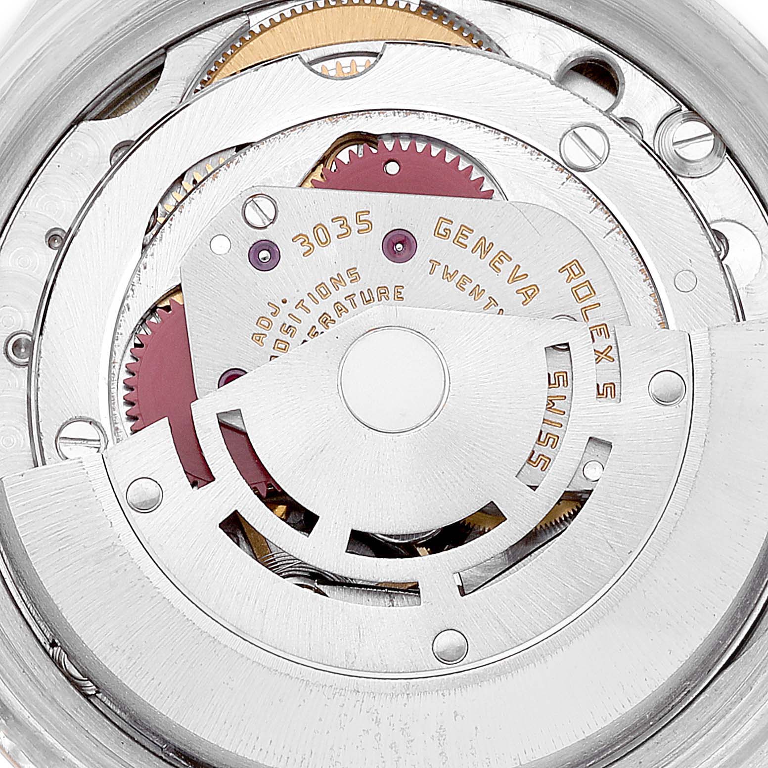 This image shows a close-up of the movement mechanism of a Rolex Datejust 16013 Men's Steel and Gold (two tone) White Dial 16013 Men's Steel and Gold (two tone) White Dial watch from the back.