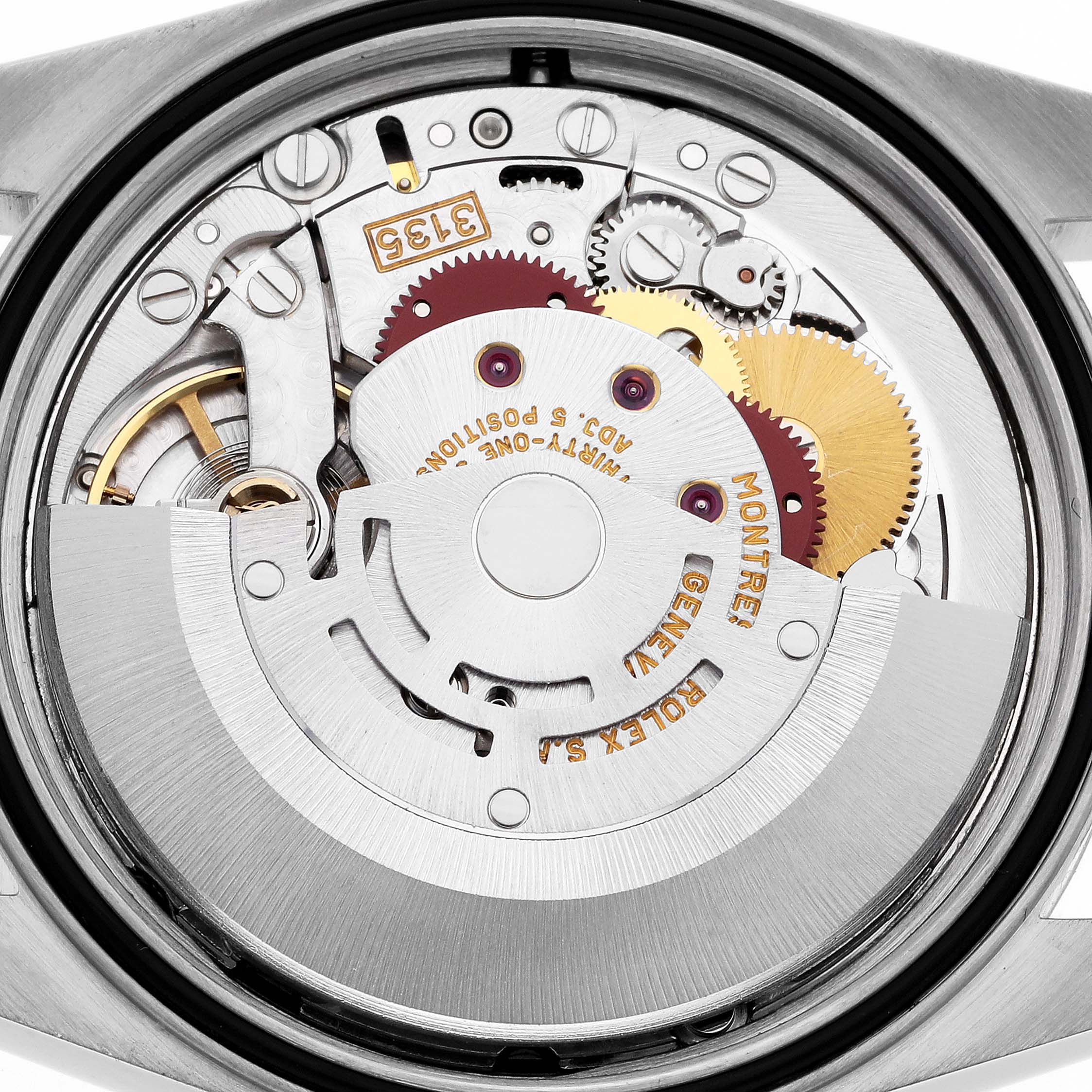The image shows a close-up of the movement inside a Rolex Datejust 16233 Men's Steel and Gold (two tone) White Dial 16233 Men's Steel and Gold (two tone) White Dial watch, highlighting gears and mechanical components.