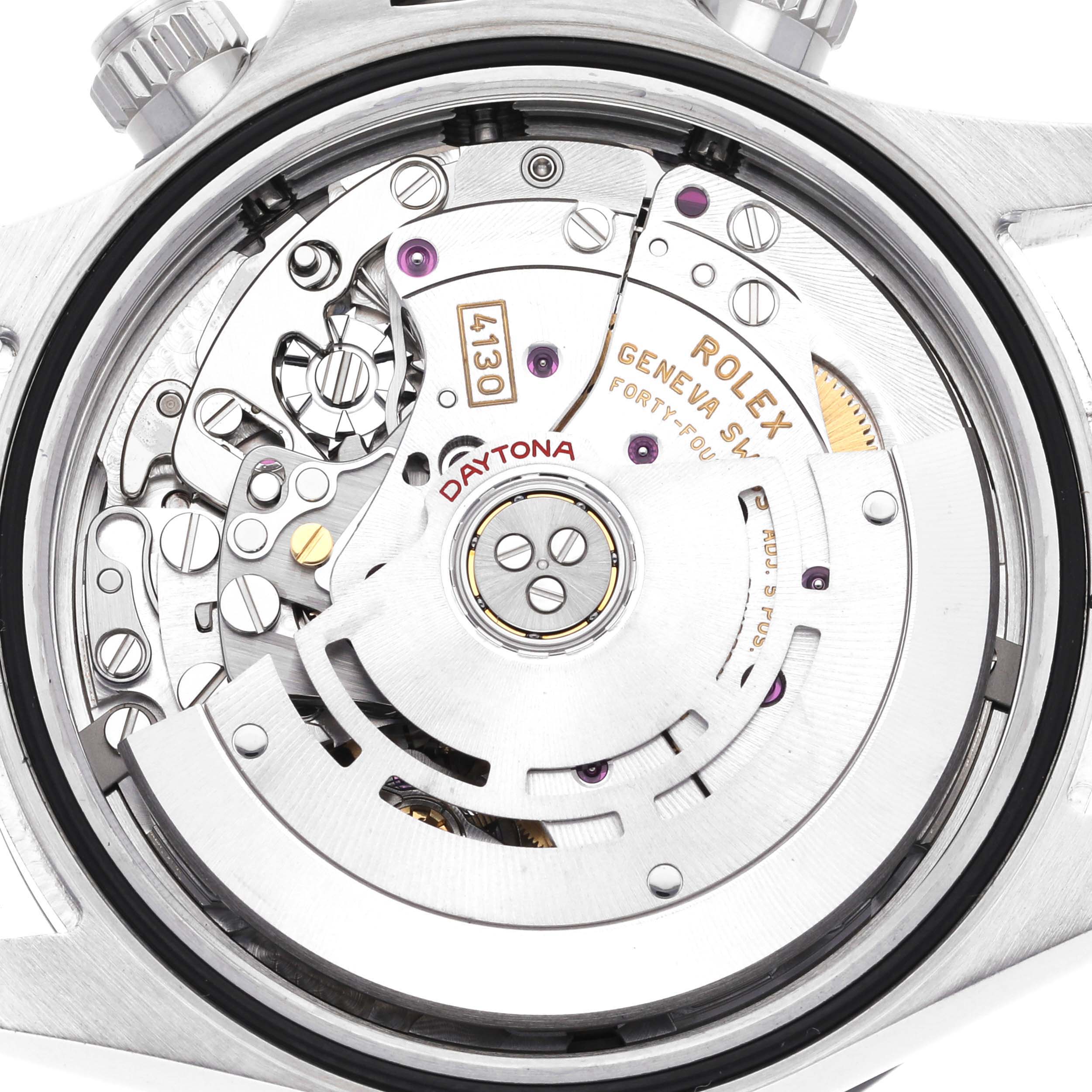 The image shows a detailed view of the Rolex Daytona 116500LN Men
s Stainless Steel Black Dial 116500LN Men
s Stainless Steel Black Dial
s movement and internal mechanism.