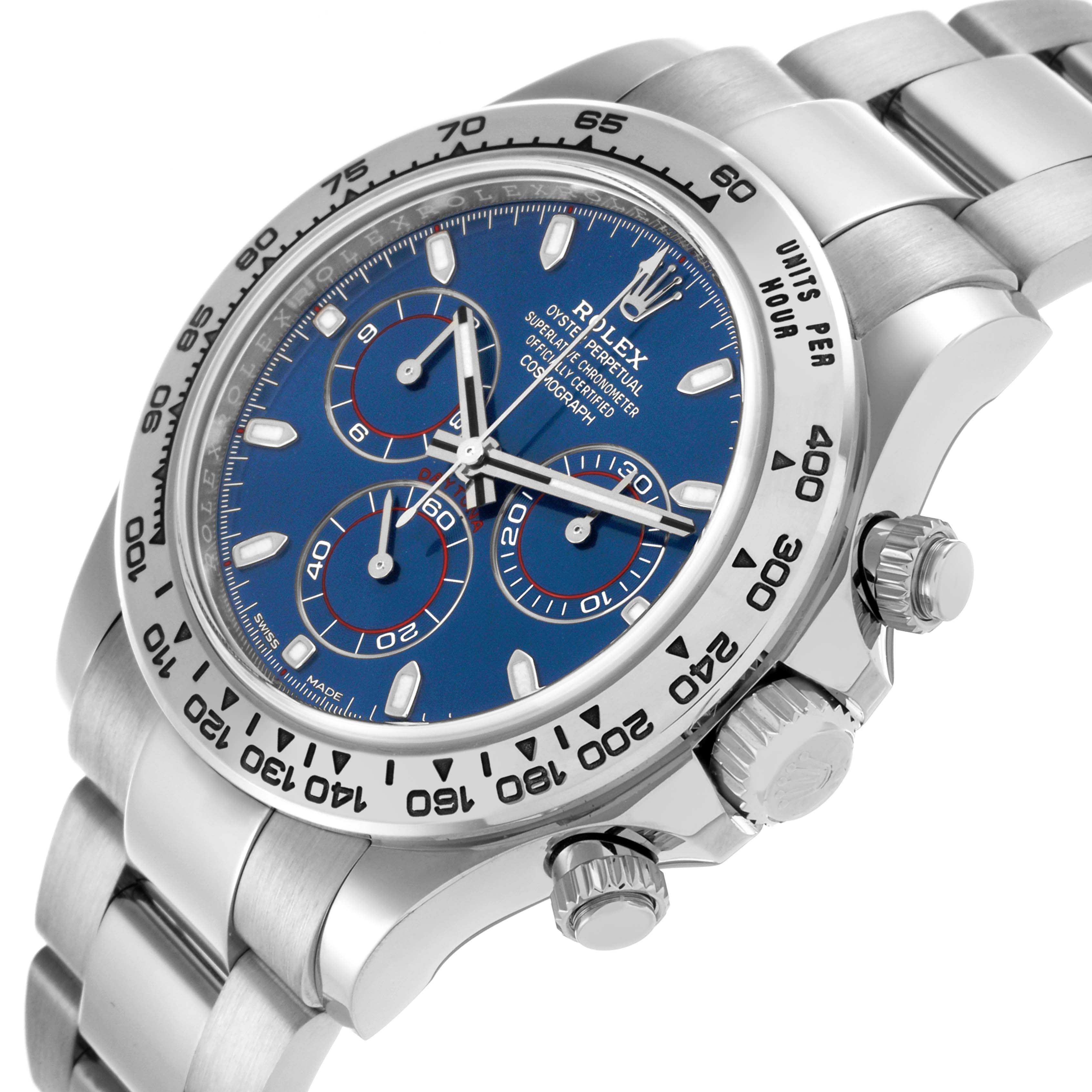 The Rolex Daytona 116509 Men's White Gold Blue Dial 116509 Men's White Gold Blue Dial watch is shown at an angle displaying the face, bezel, crown, and metal strap.
