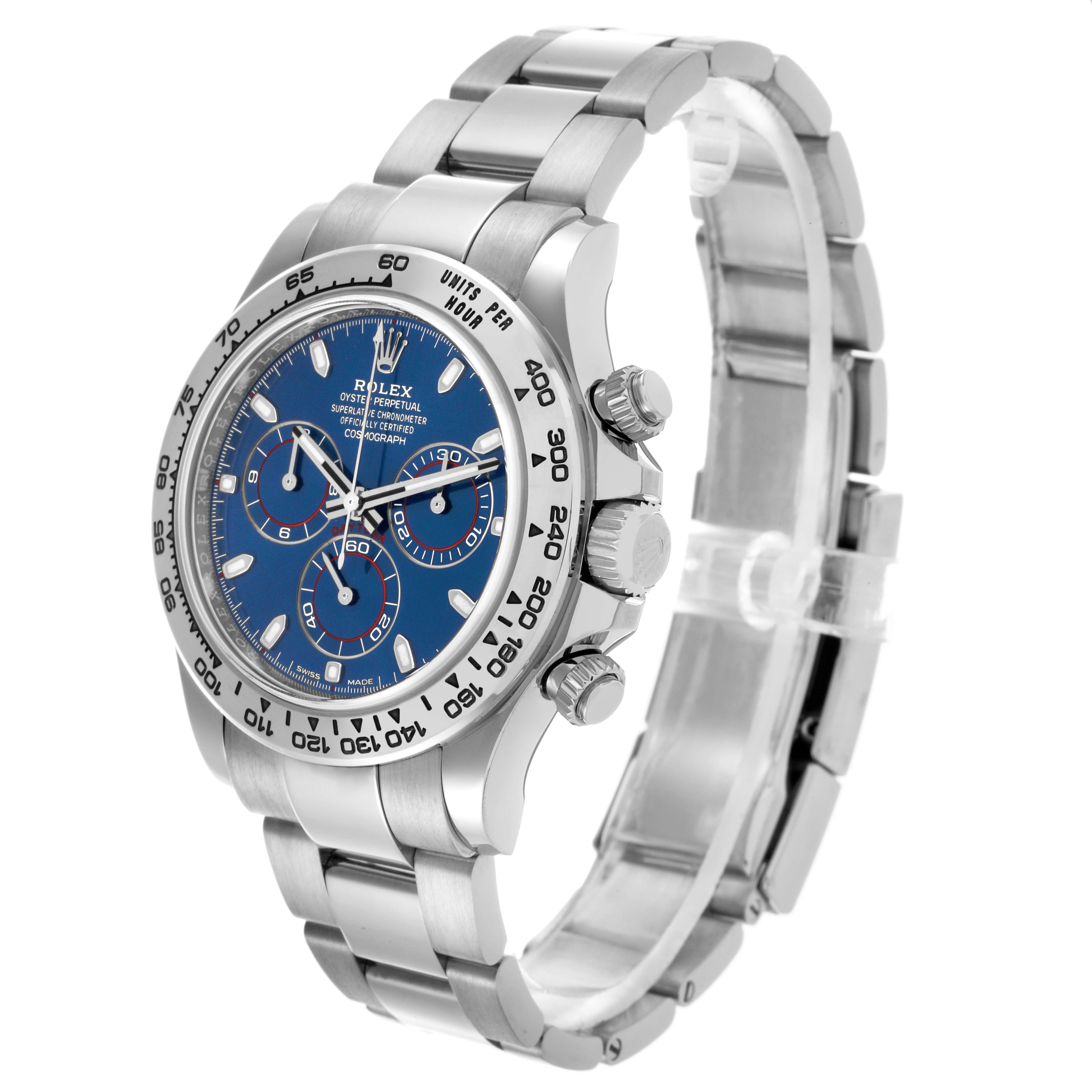 The Rolex Daytona 116509 Men's White Gold Blue Dial 116509 Men's White Gold Blue Dial watch is shown at an angle displaying the face, bezel, bracelet, and side buttons.