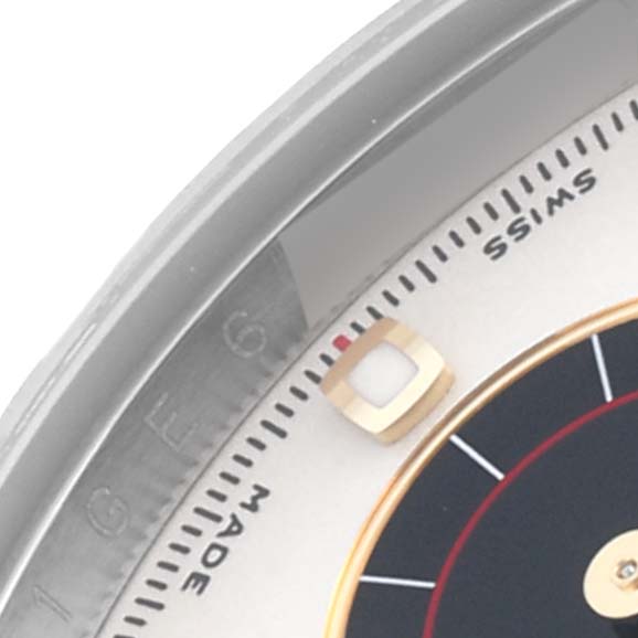 The image shows a close-up of the dial edge and bezel of a Rolex Daytona 116523 Men's Steel and Gold (two tone) Silver Dial 116523 Men's Steel and Gold (two tone) Silver Dial watch.