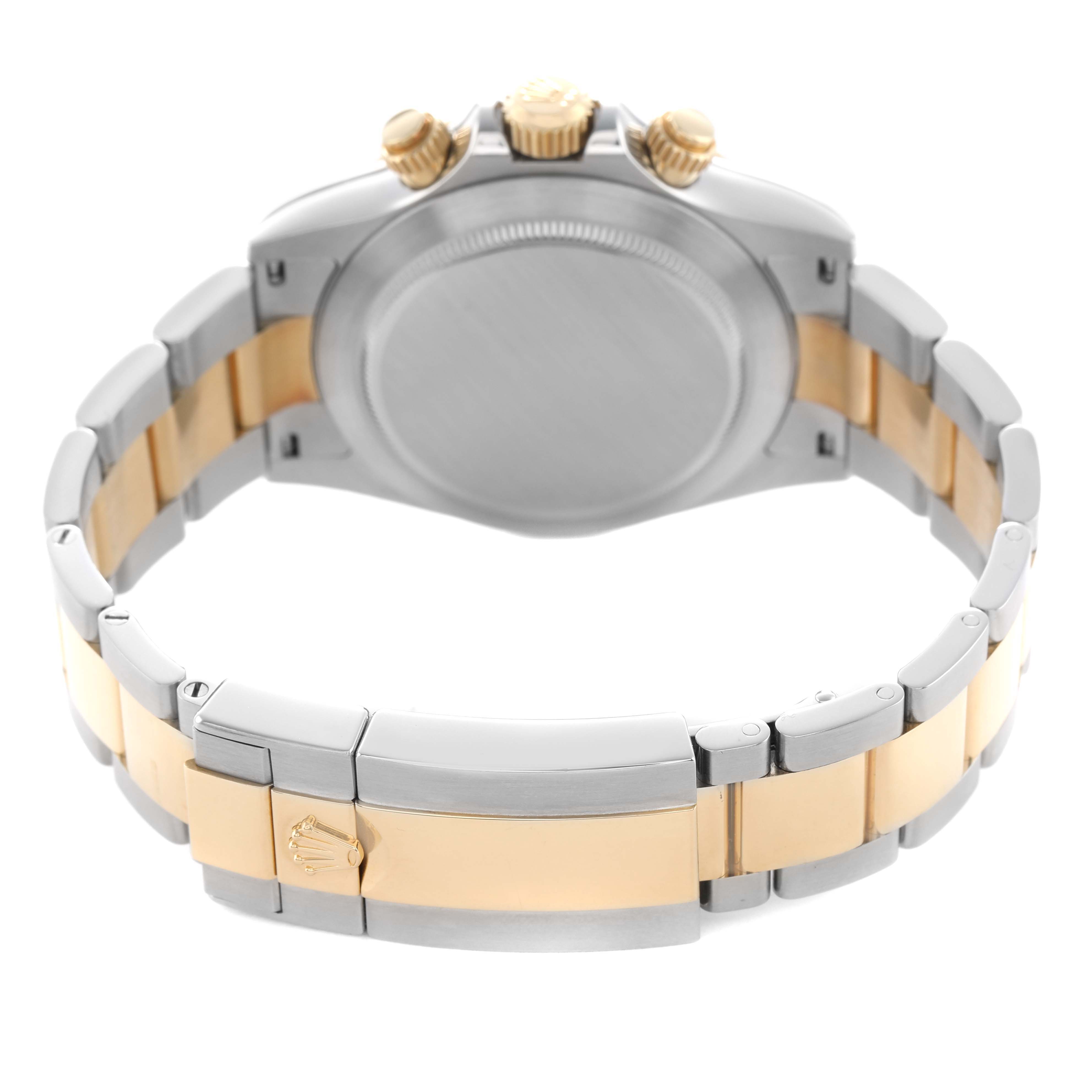 The image shows the back and clasp of a Rolex Daytona 116523 Men's Steel and Gold (two tone) Silver Dial watch, highlighting its two-tone bracelet and crown.