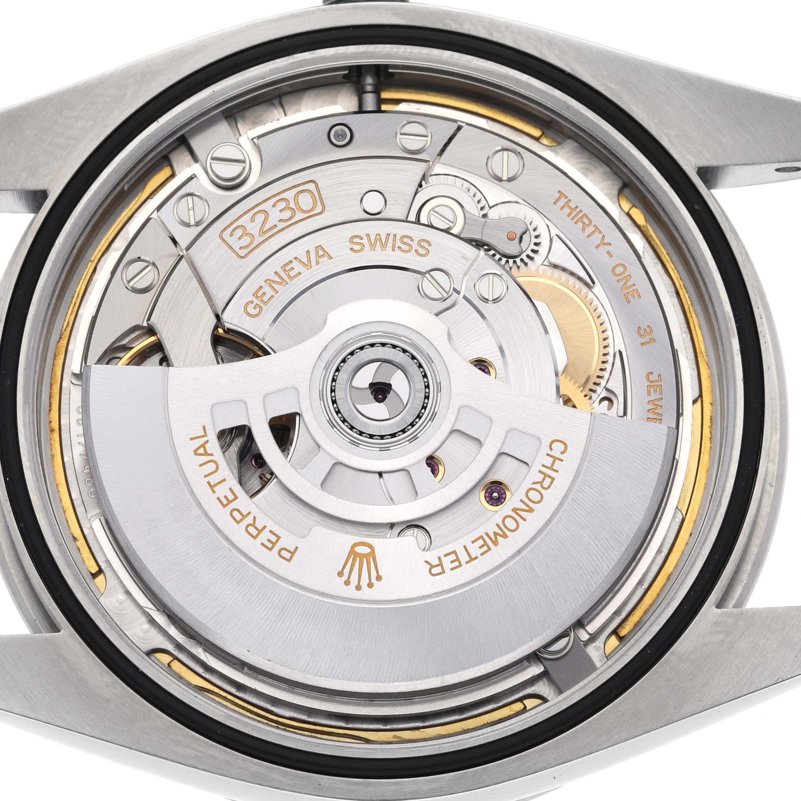 The image shows the Rolex Explorer 224270 Men's Stainless Steel Black Dial 224270 Men's Stainless Steel Black Dial's movement from the back, highlighting its intricate gears and rotor mechanism.