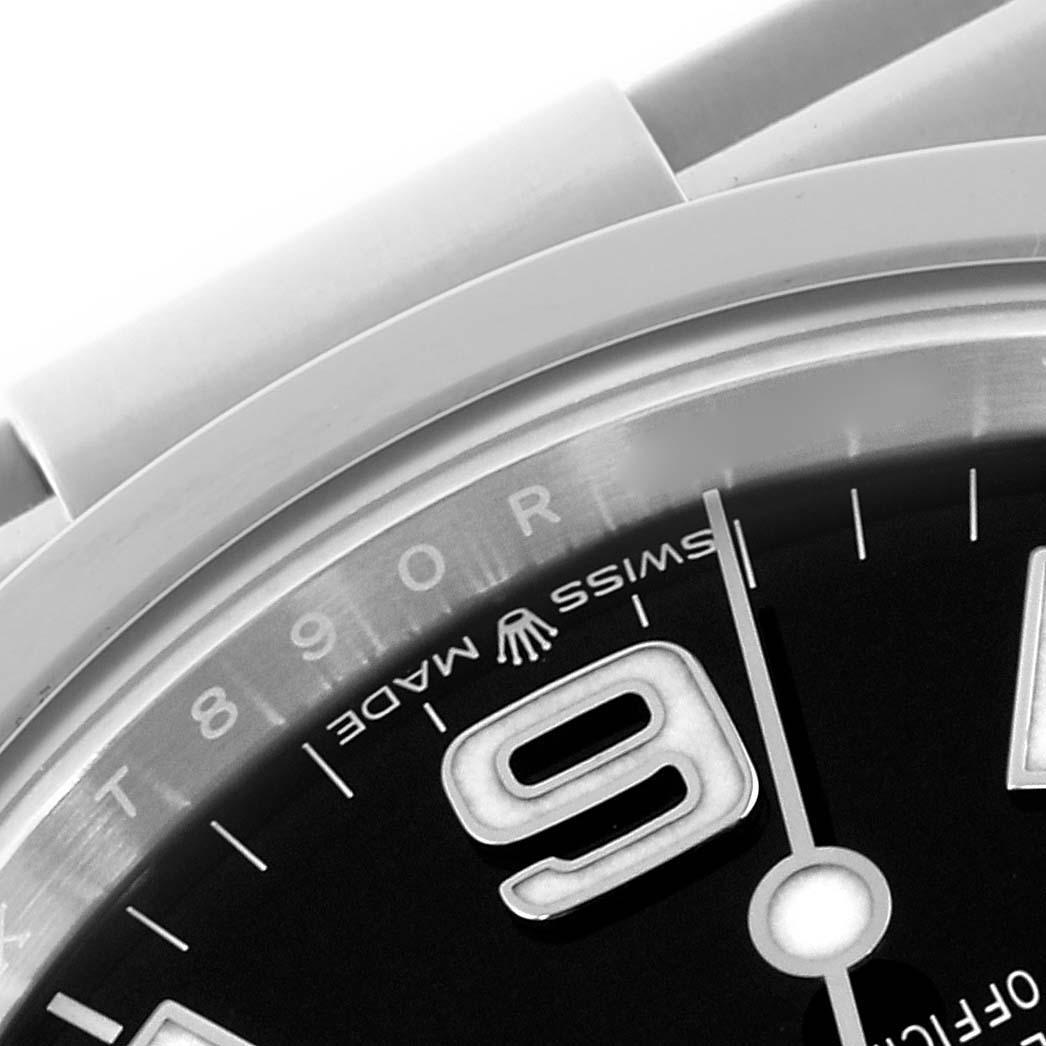 The image shows a close-up angle of the Rolex Explorer 224270 Men's Stainless Steel Black Dial 224270 Men's Stainless Steel Black Dial watch, focusing on the dial's "9" index and part of the bezel.
