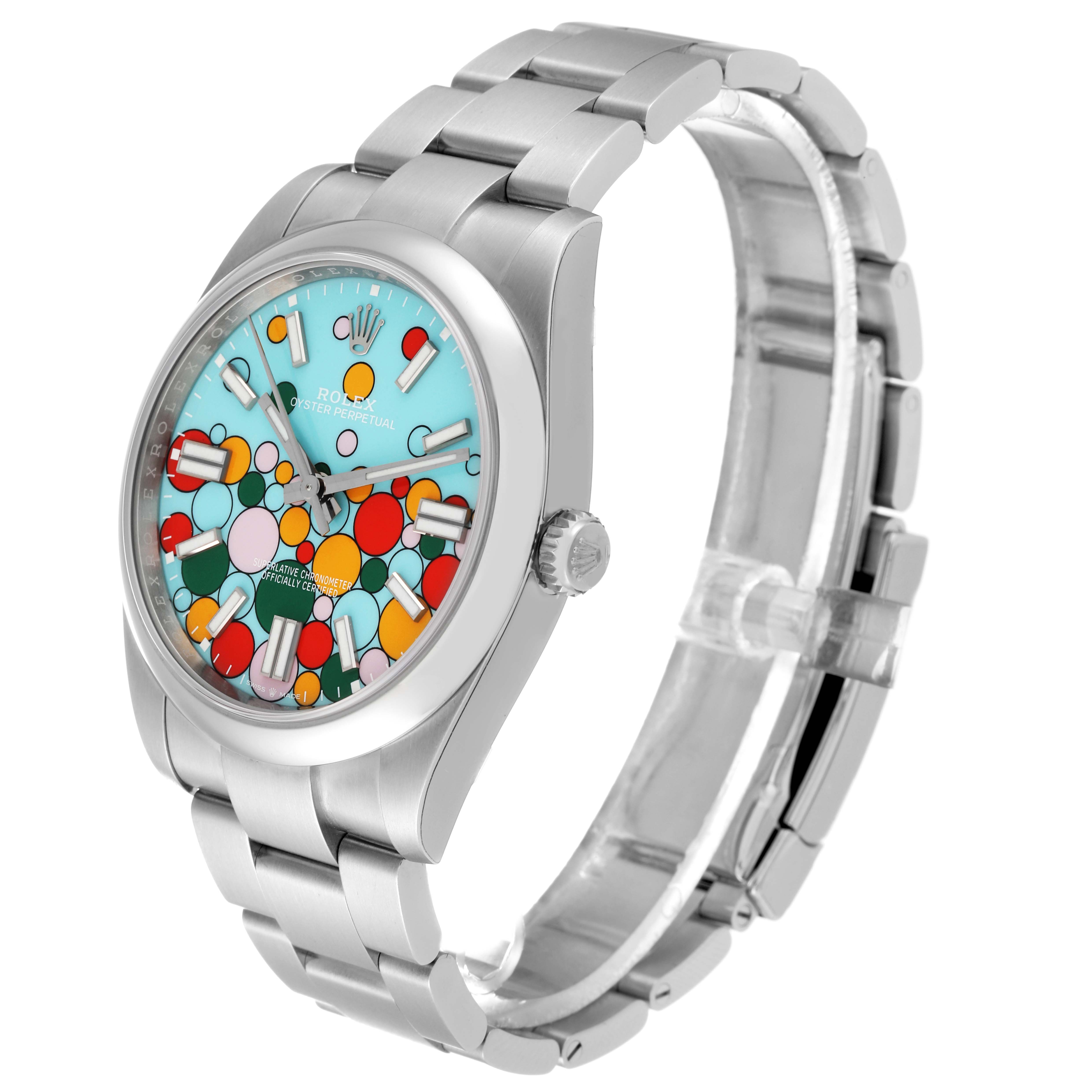 The image shows a side angle of the Rolex Oyster Perpetual 124300 Men
s Stainless Steel Blue Dial 124300 Men
s Stainless Steel Blue Dial watch, highlighting its colorful dial and stainless steel bracelet.