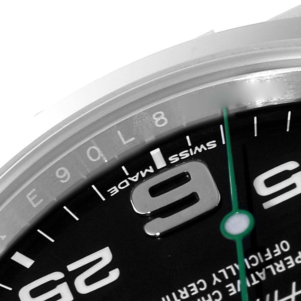 This is a close-up image of the Rolex Air-King 116900 Men's Stainless Steel Black Dial 116900 Men's Stainless Steel Black Dial watch, showing part of the dial and the number 9.