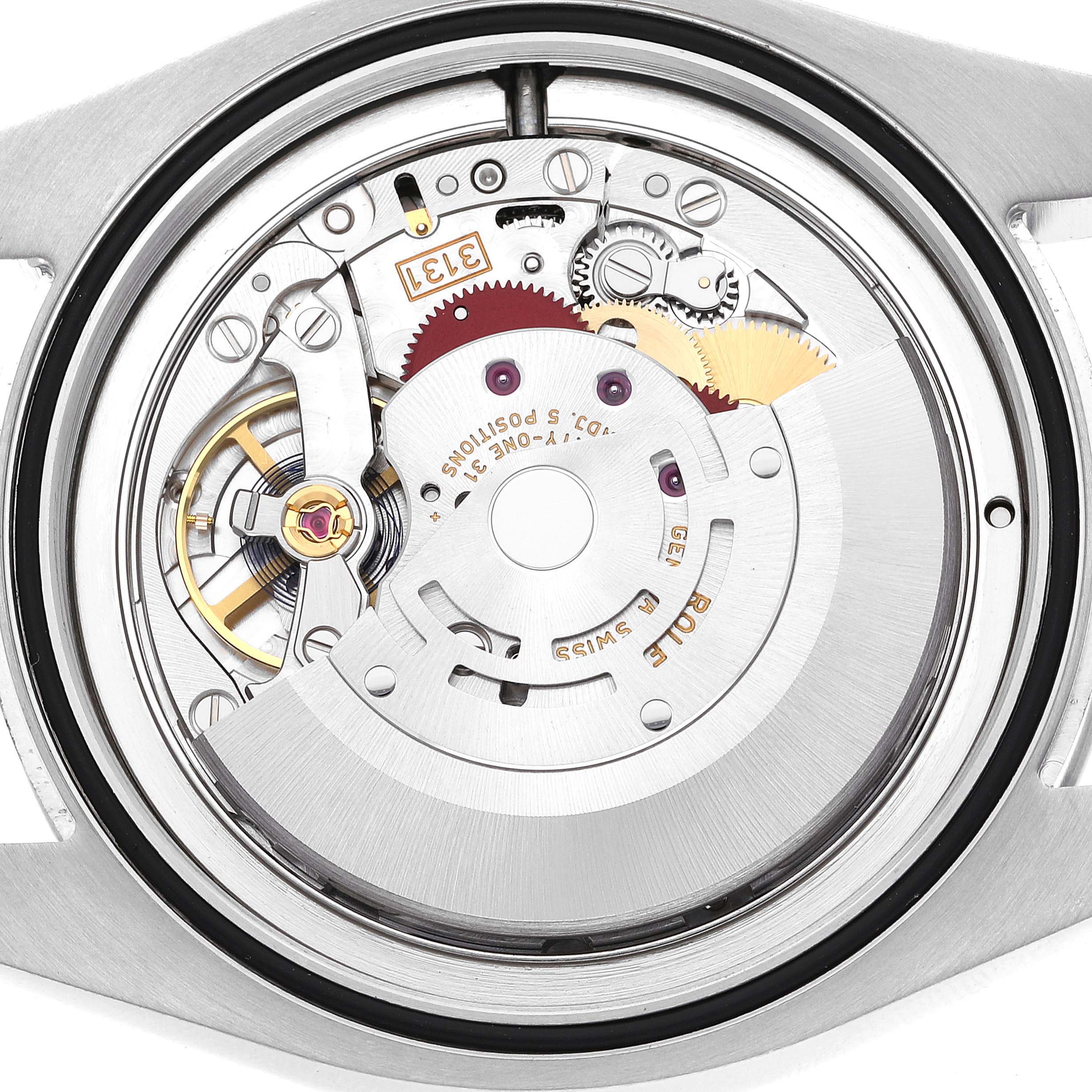 The image shows a close-up view of the internal mechanism of a Rolex Air-King 116900 Men's Stainless Steel Black Dial 116900 Men's Stainless Steel Black Dial watch from the back case.
