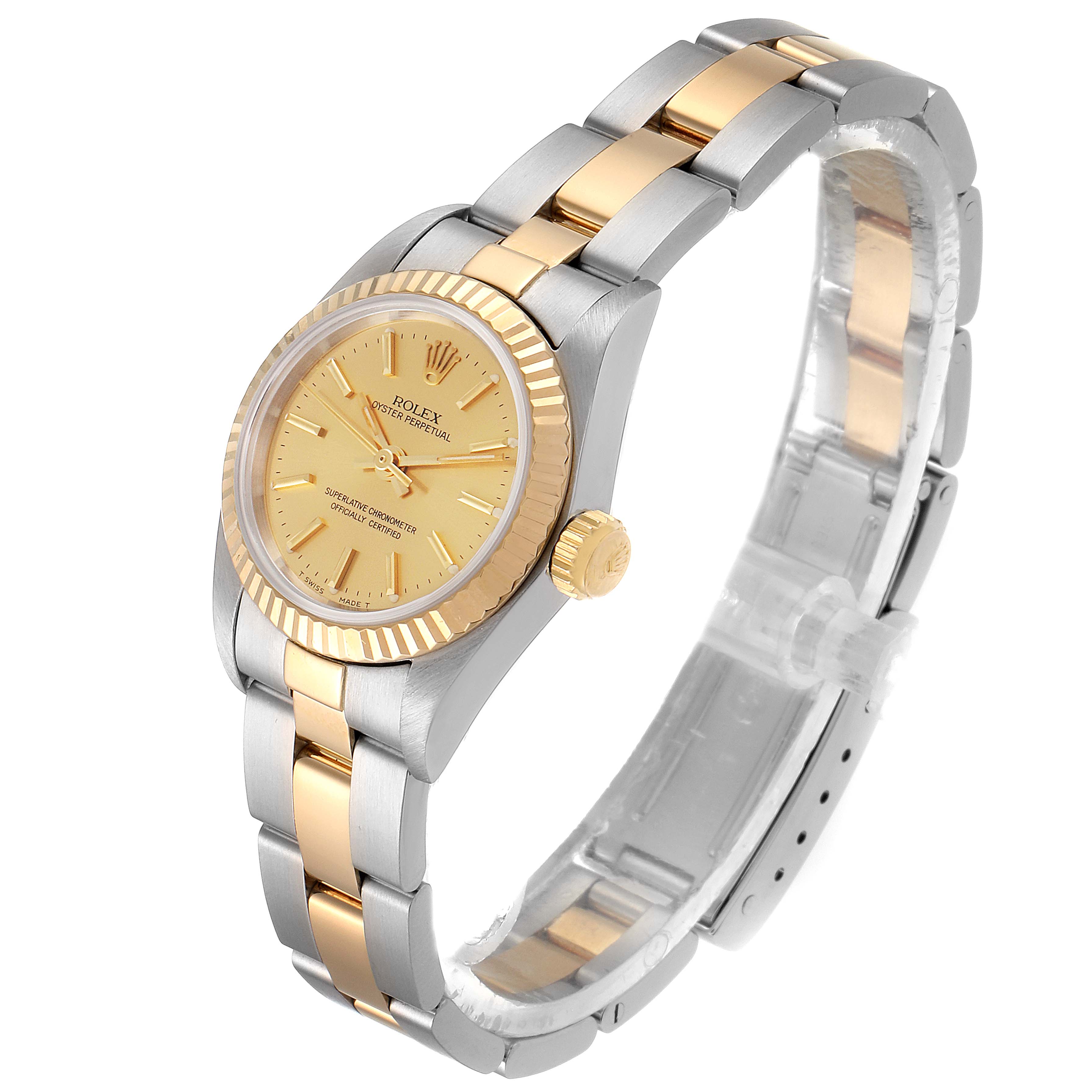 The Rolex Oyster Perpetual 67193 Women
s Steel and Gold (two tone) Champagne Dial 67193 Women
s Steel and Gold (two tone) Champagne Dial watch is shown at a slight angle, displaying its gold and silver bracelet and gold face.