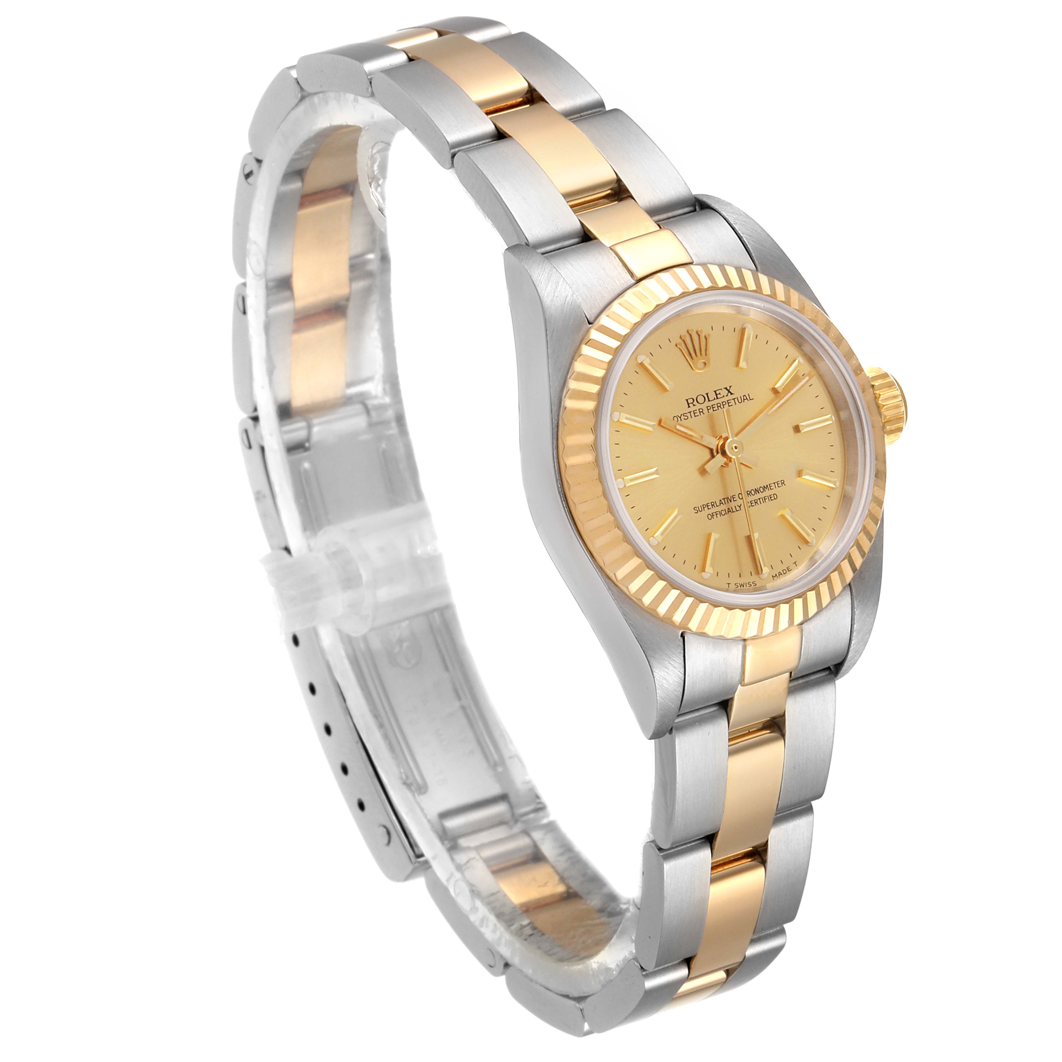 This image shows a side view of the Rolex Oyster Perpetual 67193 Women
s Steel and Gold (two tone) Champagne Dial 67193 Women
s Steel and Gold (two tone) Champagne Dial watch, highlighting its two-tone bracelet and fluted bezel.
