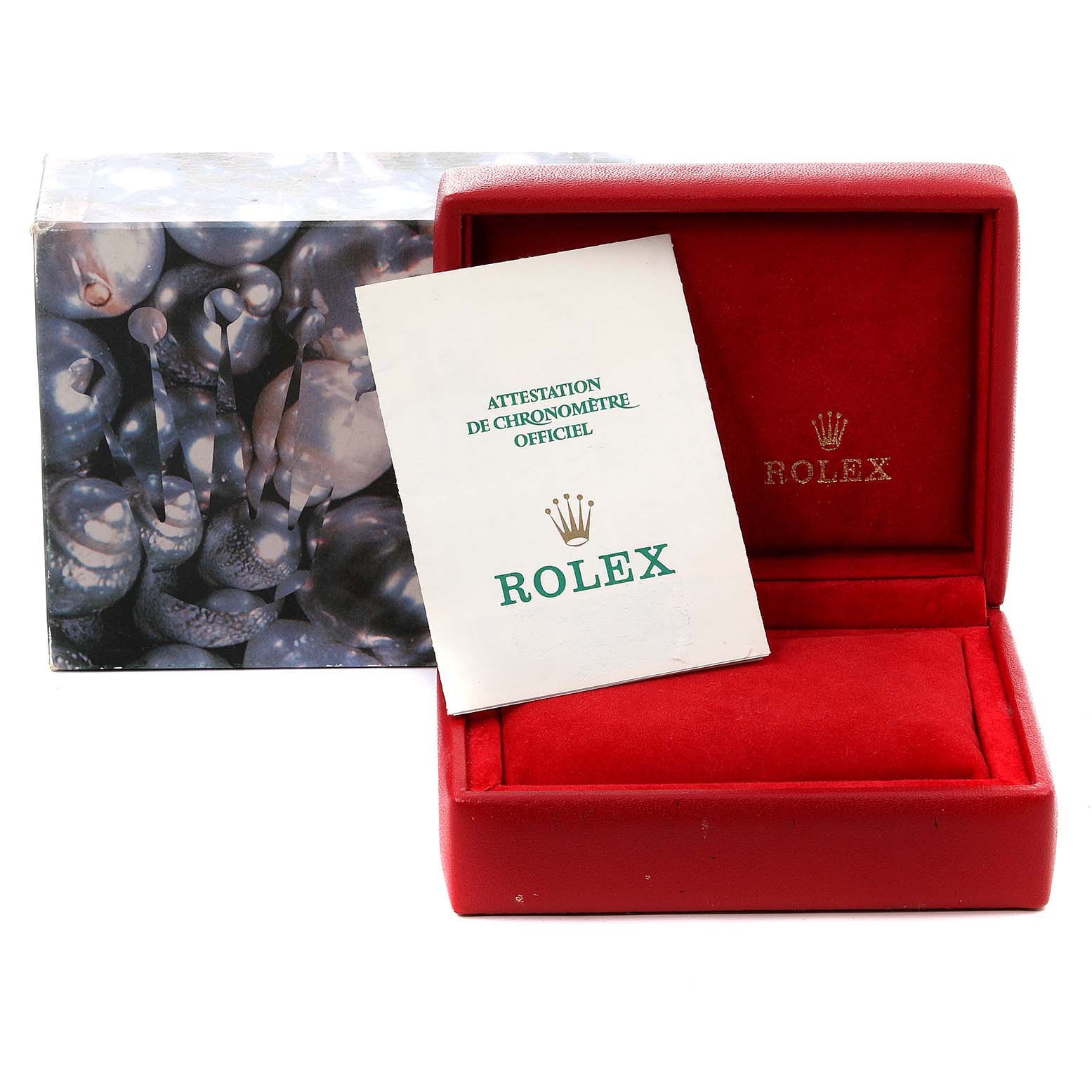 This image shows the packaging and certification for a Rolex Oyster Perpetual 67193 Women
s Steel and Gold (two tone) Champagne Dial 67193 Women
s Steel and Gold (two tone) Champagne Dial watch, including a red case and a certificate booklet.