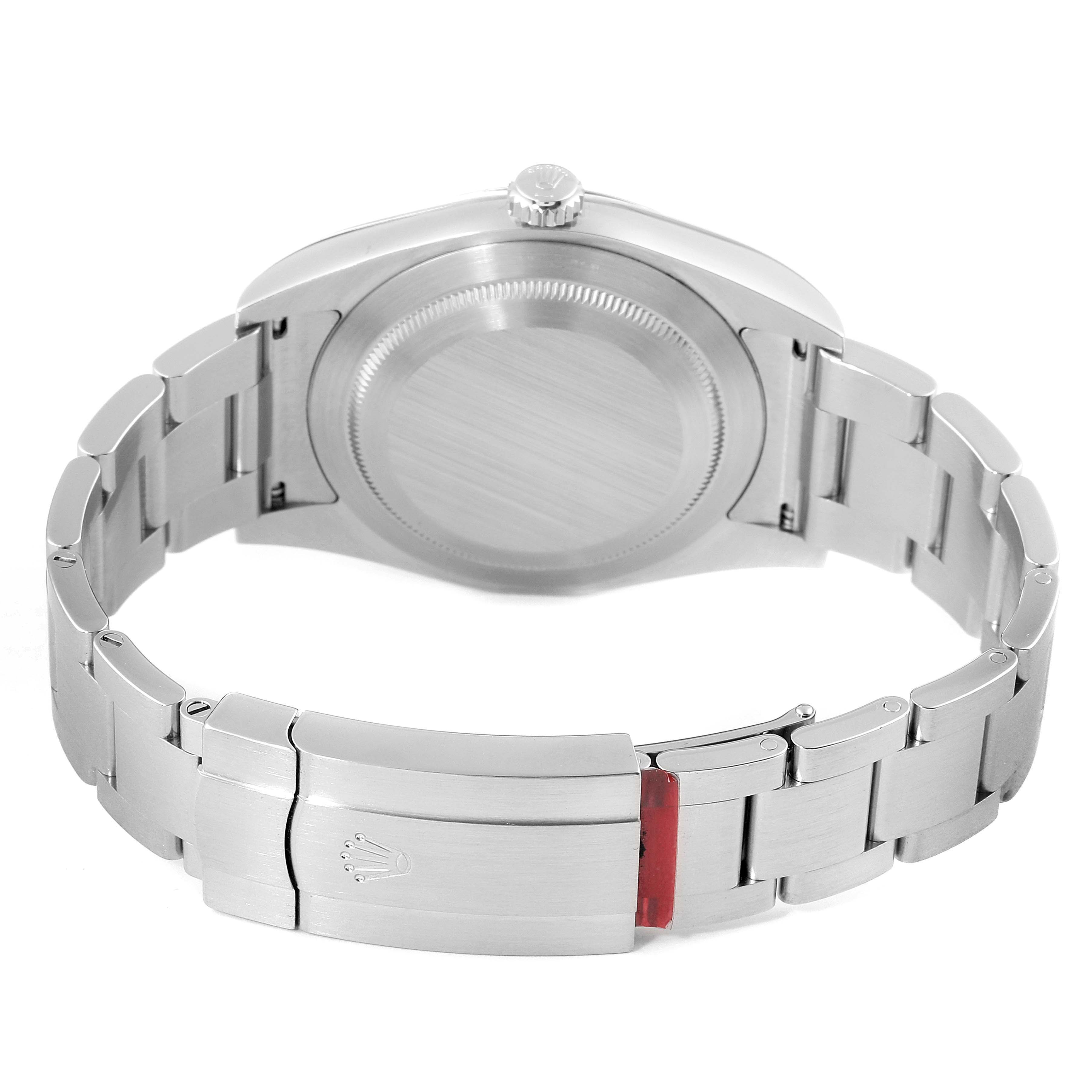 The image shows the back case and bracelet clasp of a Rolex Oyster Perpetual 114300 Men's Stainless Steel Burgundy Dial 114300 Men's Stainless Steel Burgundy Dial watch, viewed from the rear.