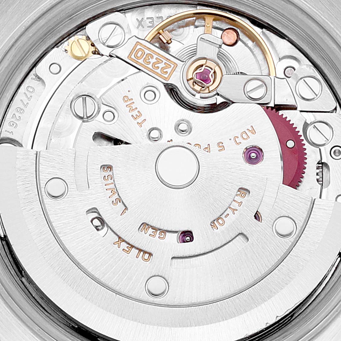 The image shows a close-up of the internal movement mechanisms of a Rolex Oyster Perpetual 76030 Women's Stainless Steel Pink Dial 76030 Women's Stainless Steel Pink Dial watch.