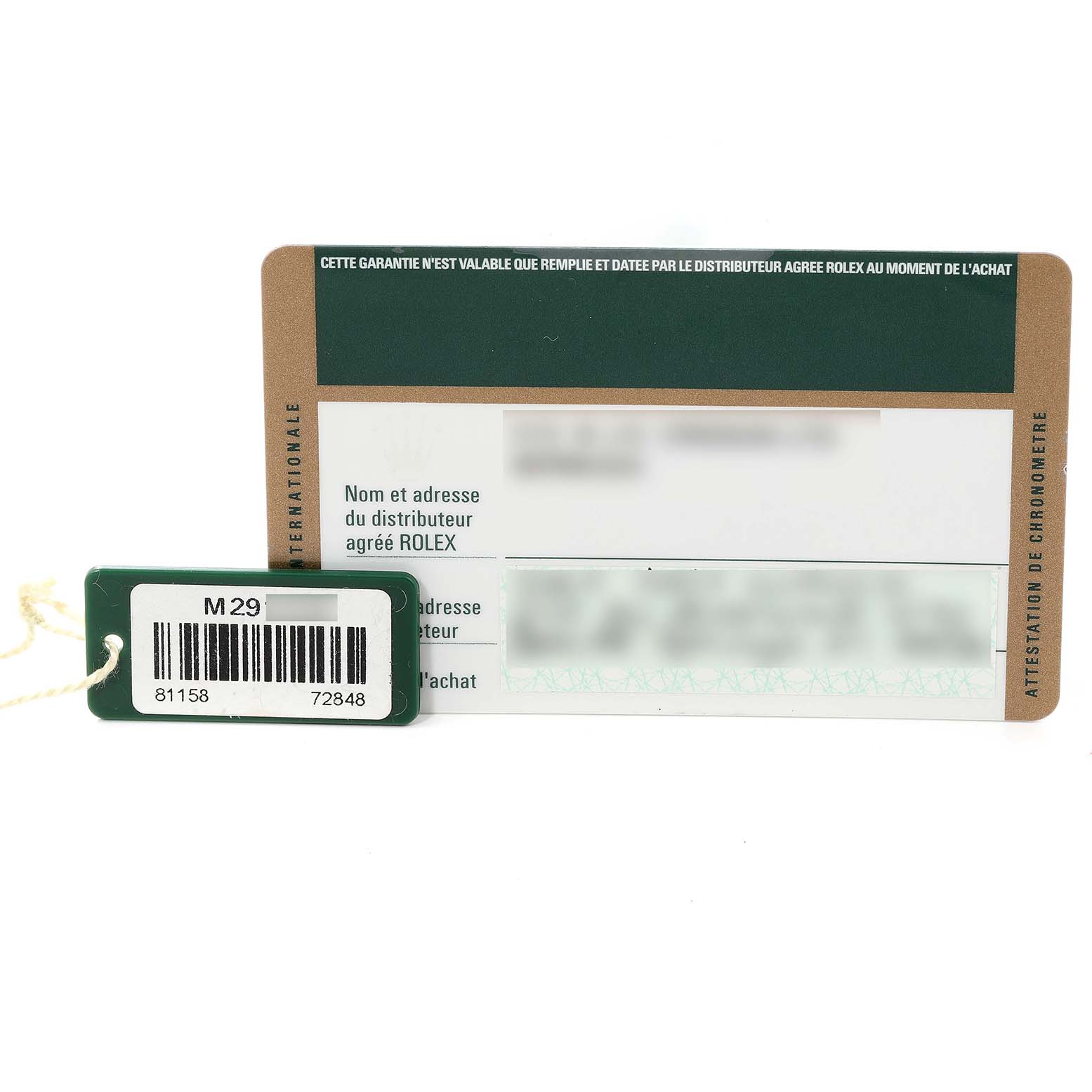 This image shows the warranty card and a tag for a Rolex Pearlmaster 81158 Women's Yellow Gold Mother of Pearl Dial 81158 Women's Yellow Gold Mother of Pearl Dial watch, viewed from the front.