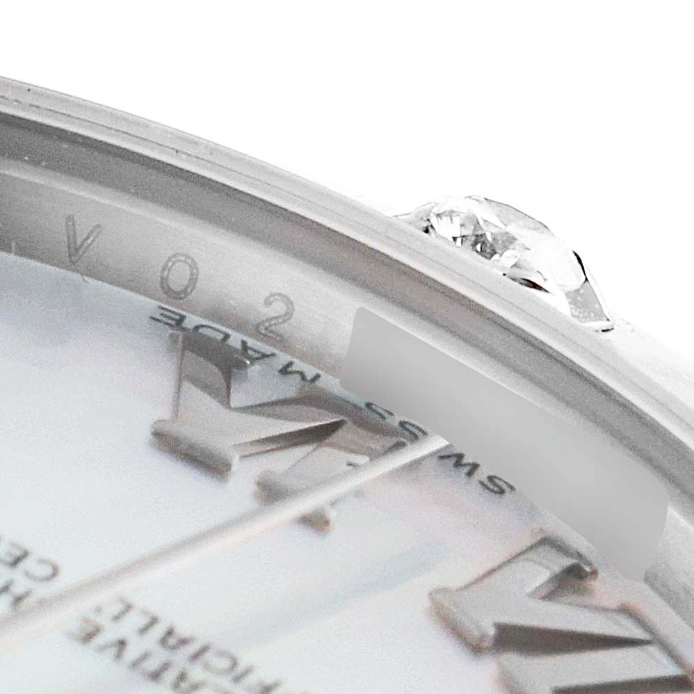 A close-up view of the Rolex Pearlmaster 81319 Women's White Gold Mother of Pearl Dial 81319 Women's White Gold Mother of Pearl Dial watch face, showing part of the bezel, crown, and dial with Roman numeral markers.