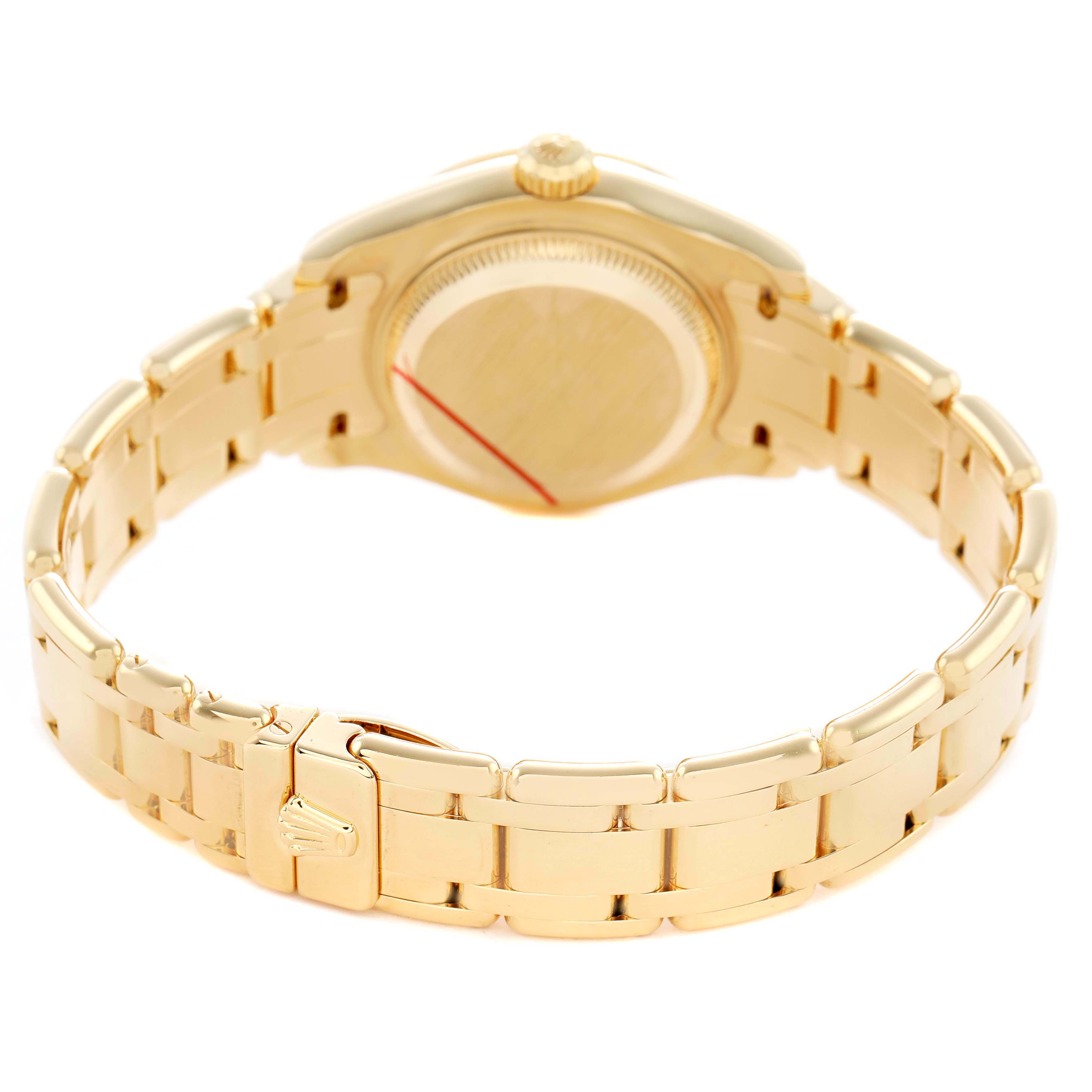 The Rolex Pearlmaster 80298 Women's Yellow Gold Black Dial watch is shown from the back, displaying the case back, bracelet, and clasp.