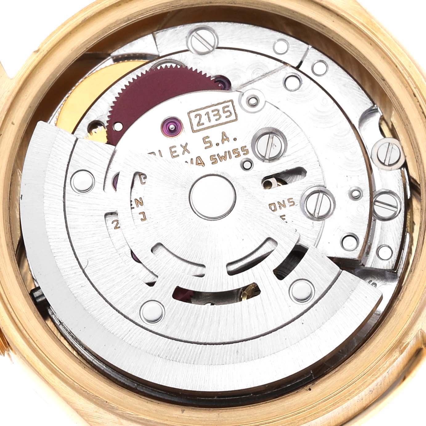 This image shows the Rolex President 69198 Women
s Yellow Gold Champagne Dial 69198 Women
s Yellow Gold Champagne Dial model
s movement, viewed from the back with its intricate components visible.