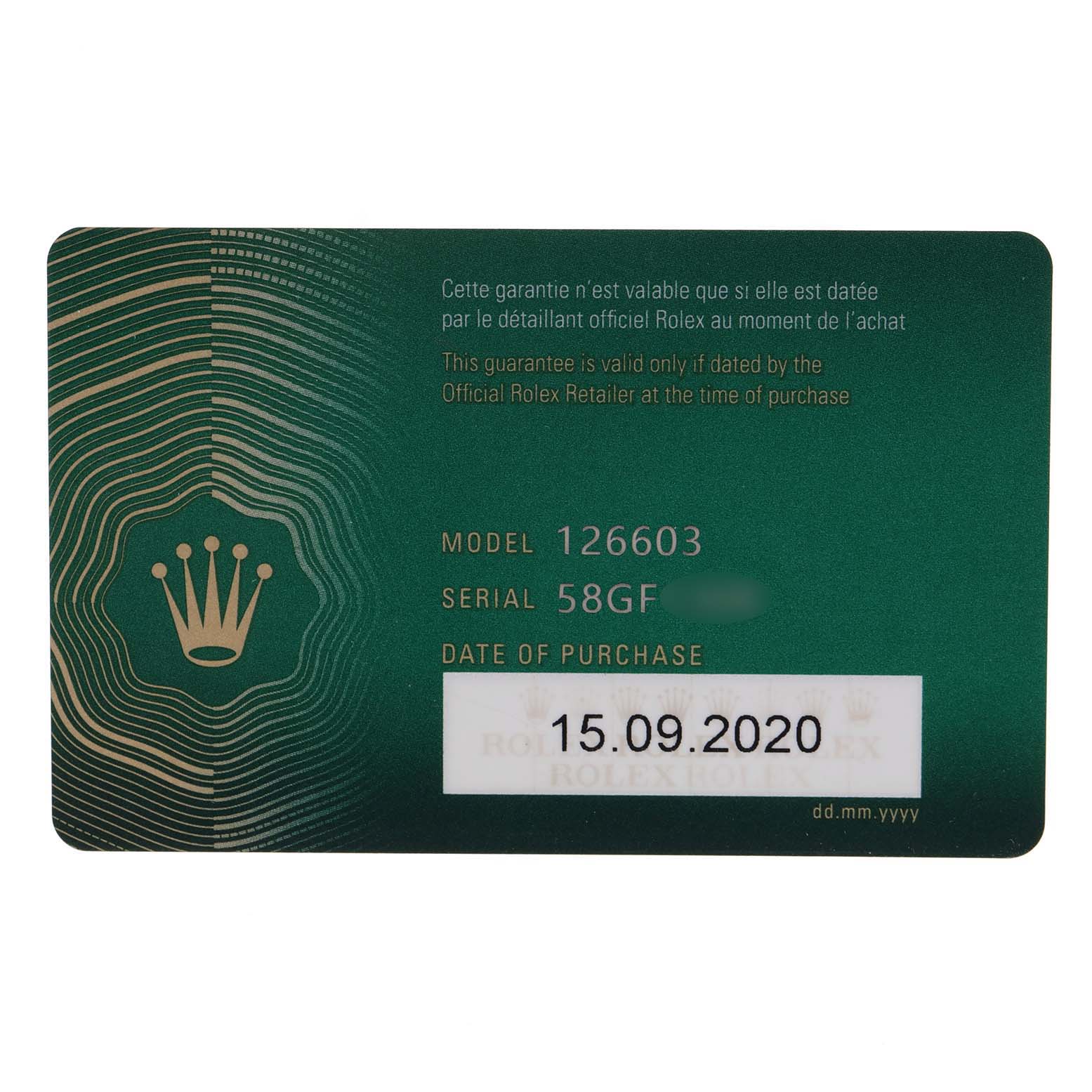 This is a close-up of the guarantee card for the Rolex Sea-Dweller 126603 Men's Steel and Gold (two tone) Black Dial 126603 Men's Steel and Gold (two tone) Black Dial model 126603.