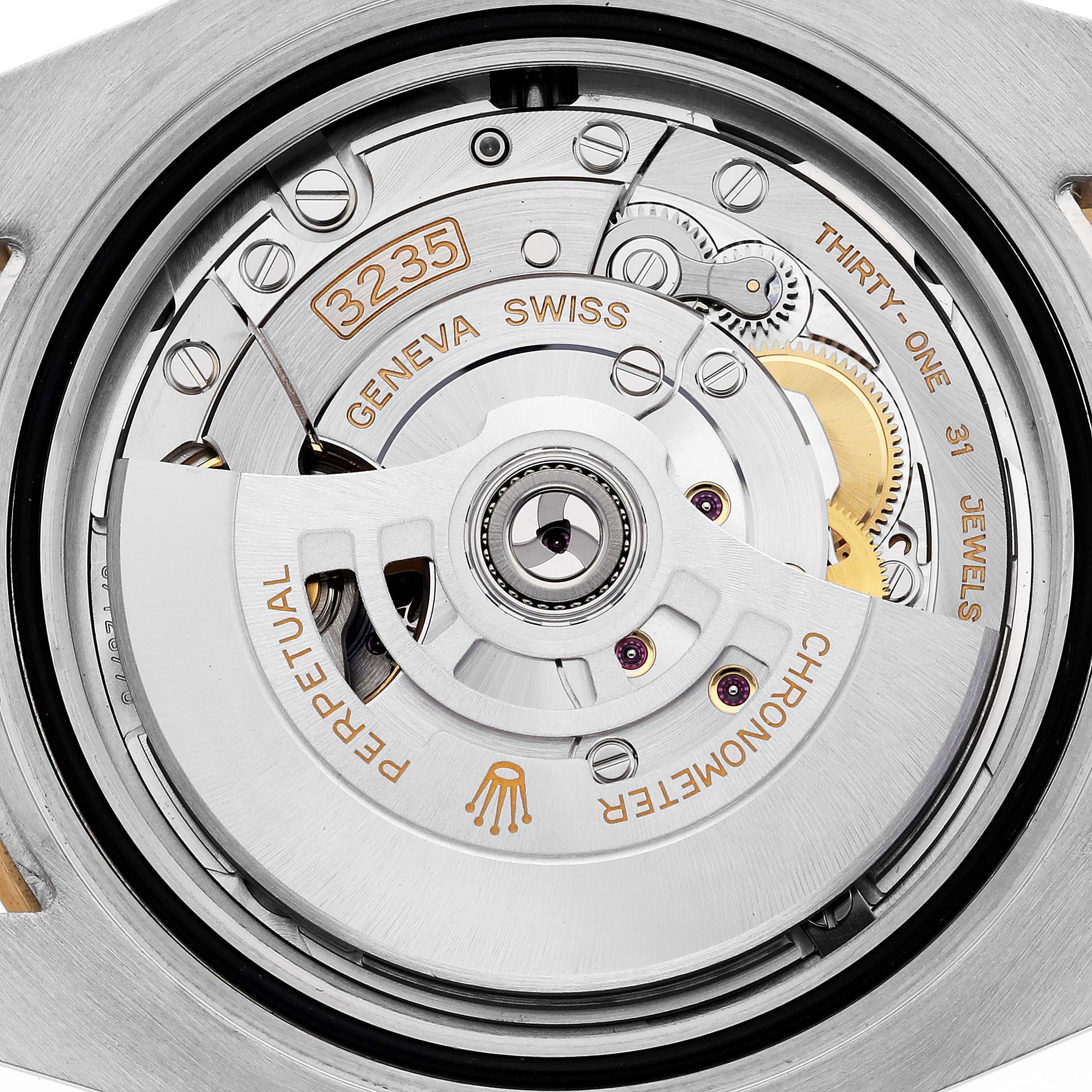 The image shows the movement and mechanics of a Rolex Submariner 126613LB Men's Steel and Gold (two tone) Blue Dial 126613LB Men's Steel and Gold (two tone) Blue Dial watch from the back side.