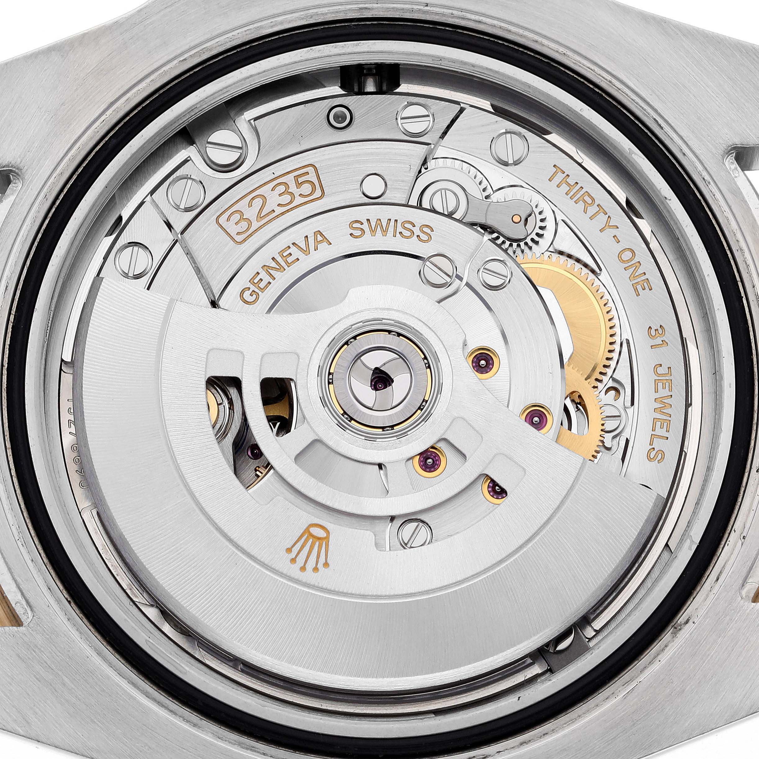 The image displays the movement mechanism of a Rolex Submariner 126613LB Men's Steel and Gold (two tone) Blue Dial 126613LB Men's Steel and Gold (two tone) Blue Dial, focusing on its rotor and internal components.