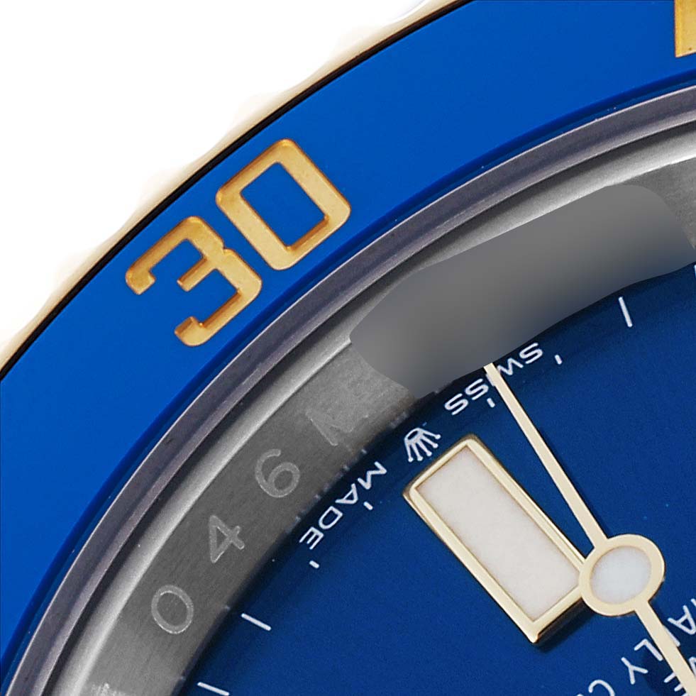 The image shows a close-up of the blue bezel and dial of a Rolex Submariner 126613LB Men's Steel and Gold (two tone) Blue Dial 126613LB Men's Steel and Gold (two tone) Blue Dial, highlighting the number 30 and part of the watch face.
