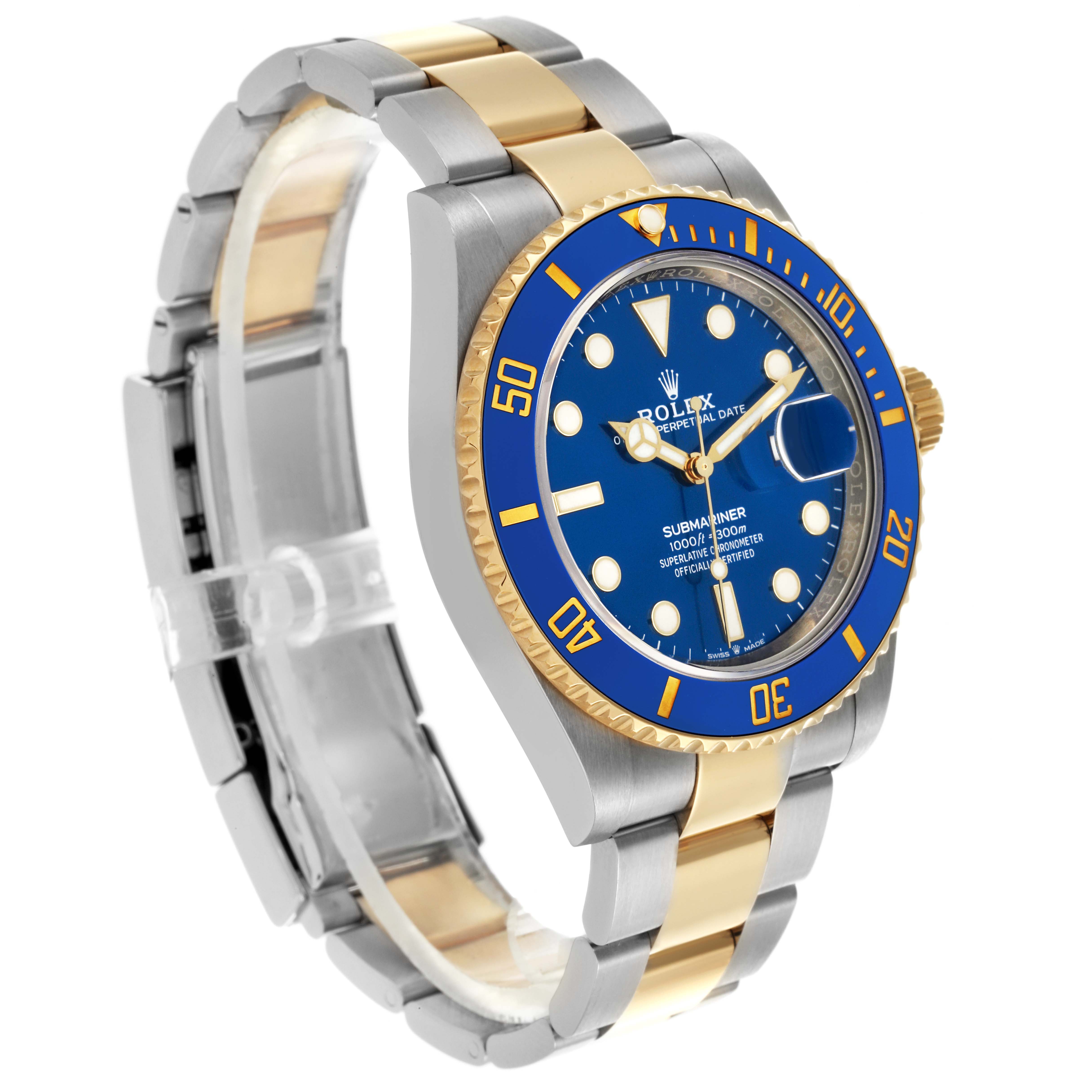 The watch is a Rolex Submariner 126613LB Men's Steel and Gold (two tone) Blue Dial 126613LB Men's Steel and Gold (two tone) Blue Dial, shown at an angle highlighting its blue dial, rotating bezel, and two-tone bracelet.
