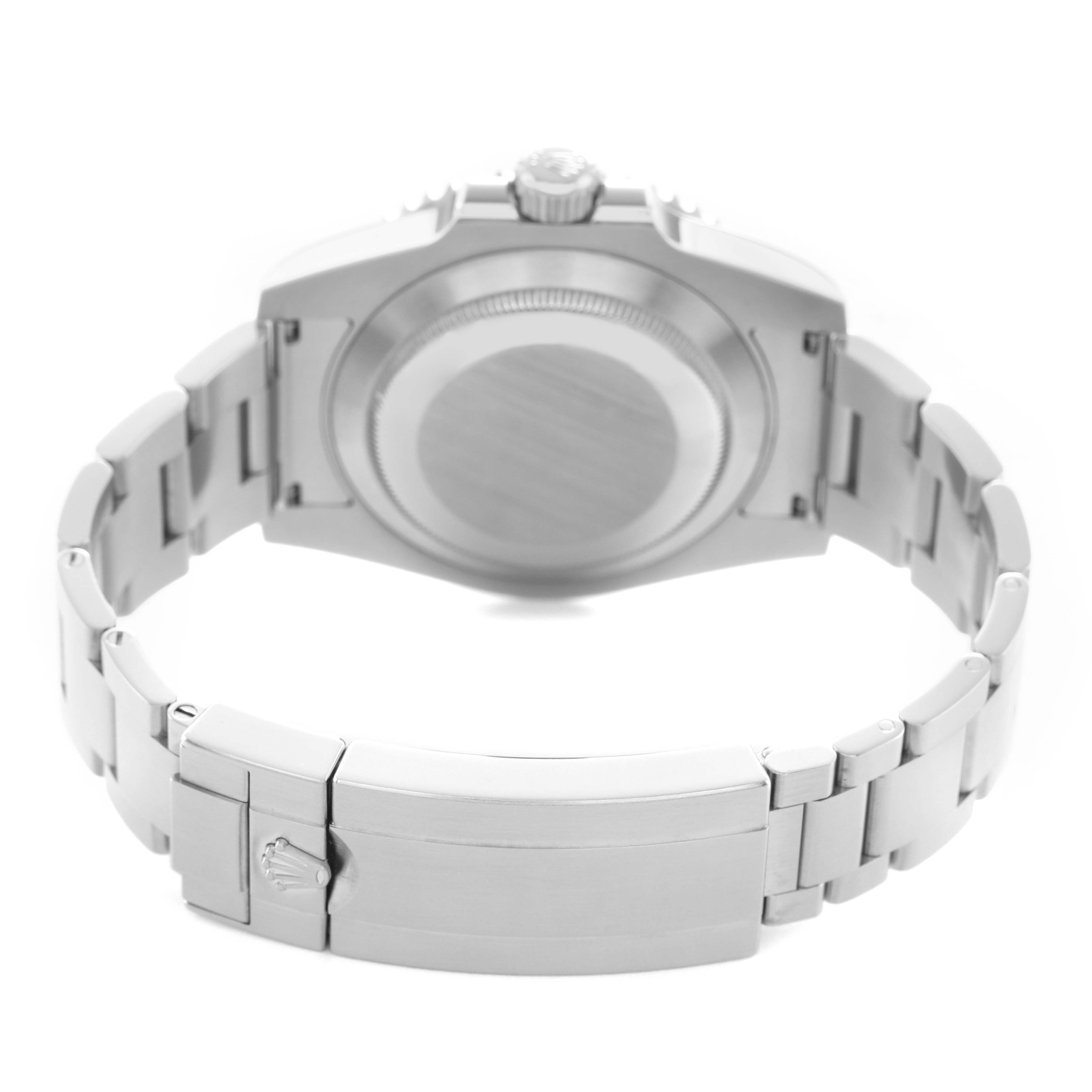 The image shows the back view of a Rolex Submariner 114060 Men's Stainless Steel Black Dial, highlighting the case back and metal bracelet with clasp.