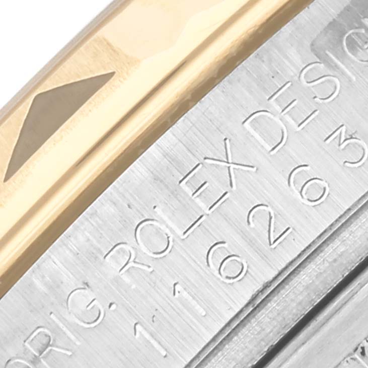 The image shows a close-up of the bezel and engraved details on the Rolex Turn-o-Graph 116263 Men's Steel and Gold (two tone) Grey Dial 116263 Men's Steel and Gold (two tone) Grey Dial model.