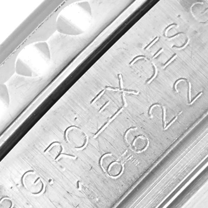 The image shows a close-up view of the engraved edge of a Rolex Yacht-Master 16622 Men
s Stainless Steel Silver Dial 16622 Men
s Stainless Steel Silver Dial, focusing on the watch
s serial and model number.