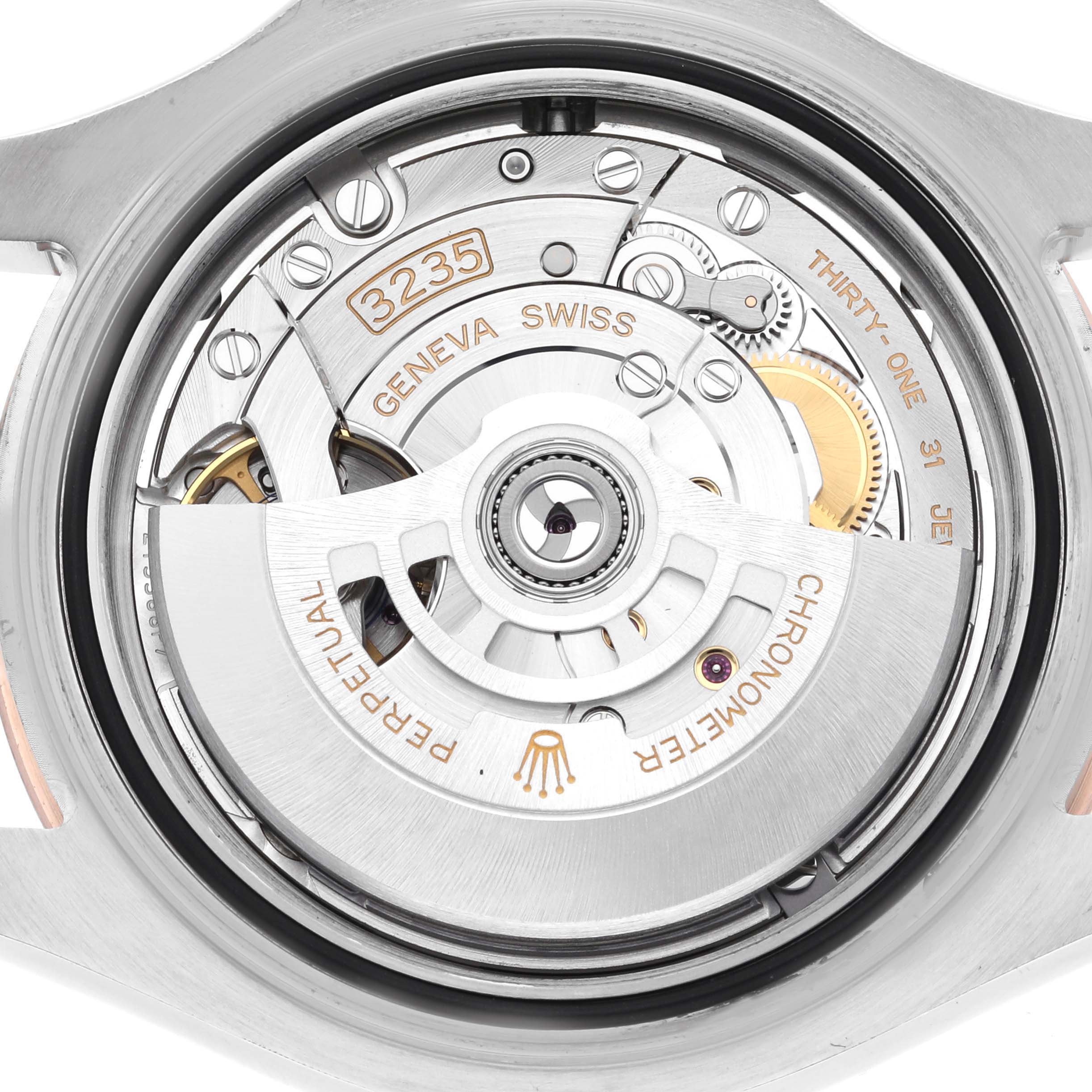 The image shows the intricate movement mechanism of a Rolex Yacht-Master 126621 Men's Steel and Gold (two tone) Black Dial 126621 Men's Steel and Gold (two tone) Black Dial watch from a direct rear angle.