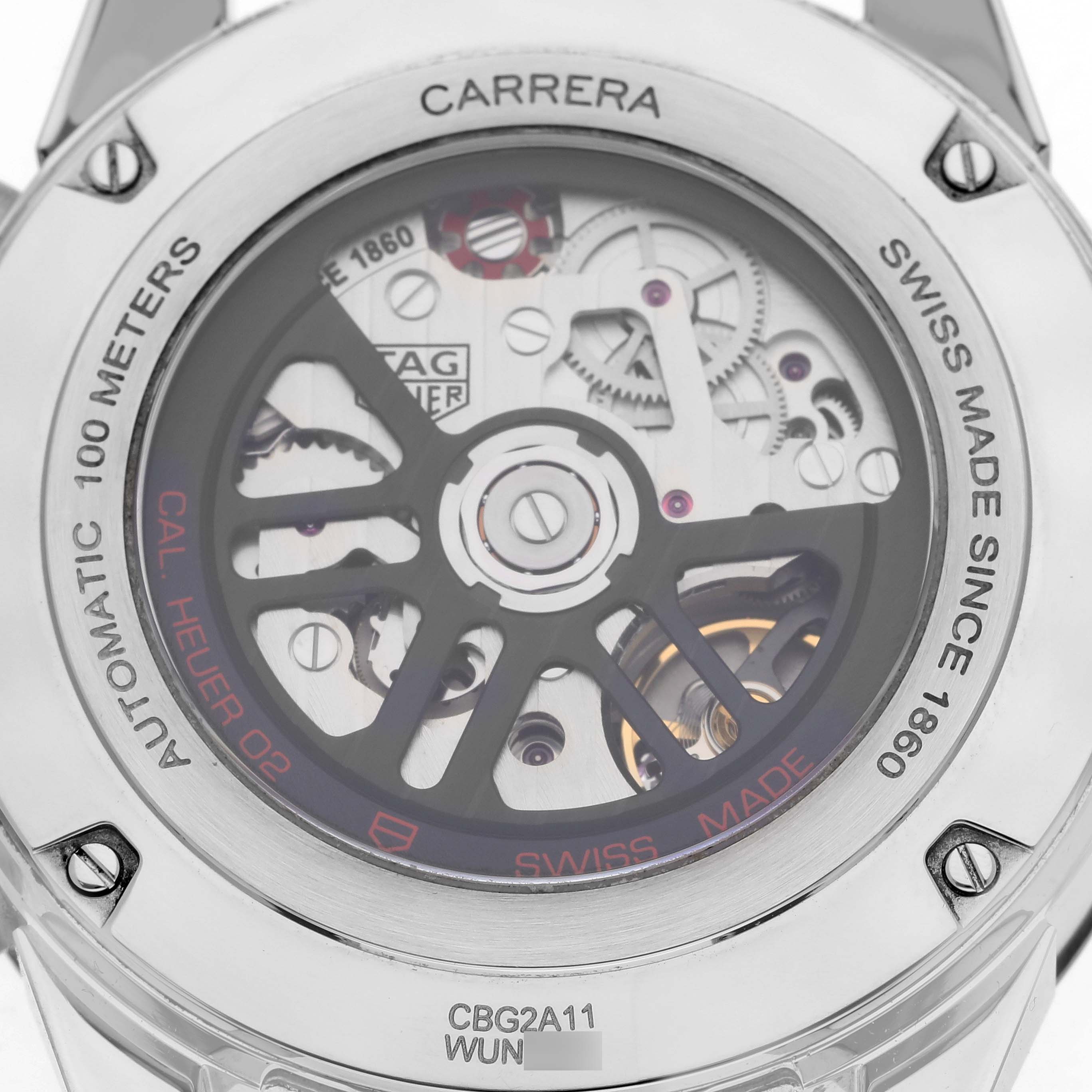 The image shows the back of a Tag Heuer Carrera CBG2A11.FC6460 Men's Stainless Steel Blue Dial CBG2A11.FC6460 Men's Stainless Steel Blue Dial watch, revealing its movement and engravings.