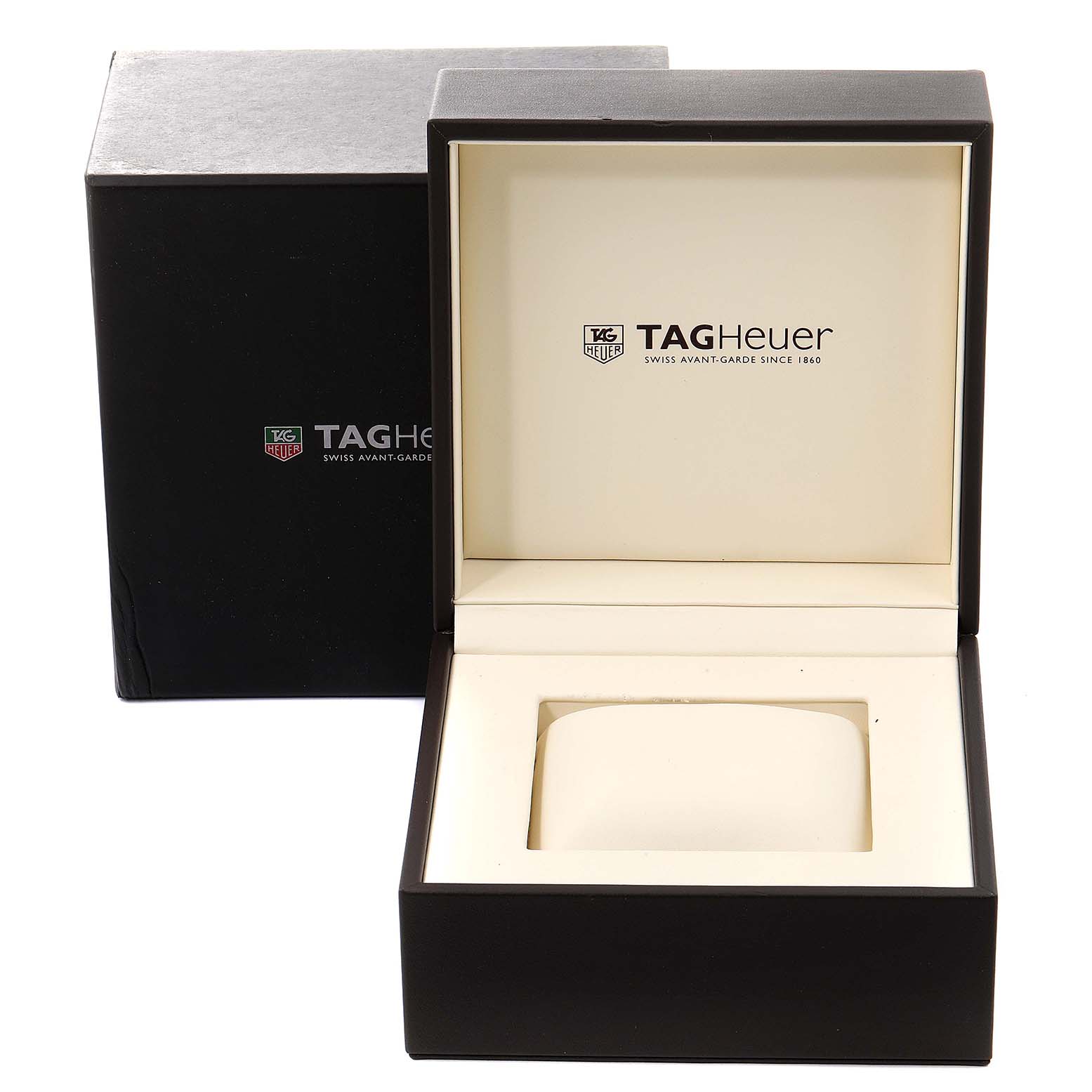 The image shows an open Tag Heuer Carrera CAS2111.BA0730 Men
s Stainless Steel Silver Dial CAS2111.BA0730 Men
s Stainless Steel Silver Dial watch box with a closed outer box behind it, viewed from the front.