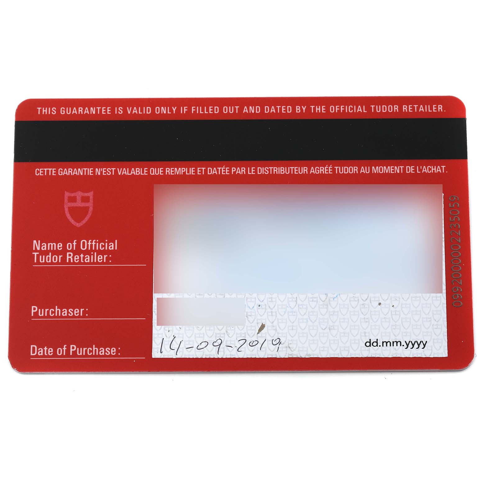 This image shows the warranty card for a Tudor Heritage Black Bay 79830RB Men's Stainless Steel Black Dial 79830RB Men's Stainless Steel Black Dial watch from an overhead angle.