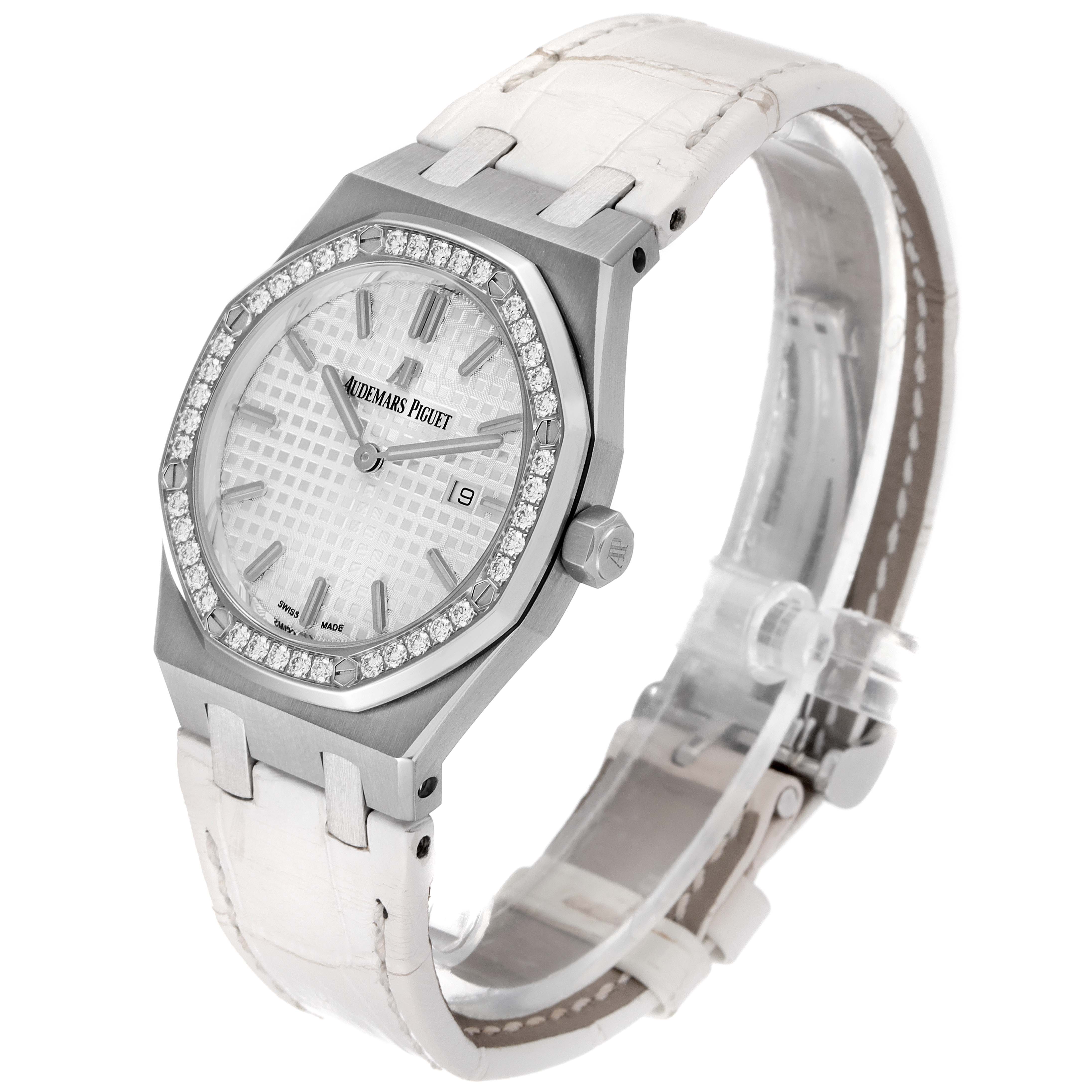 This image shows an angled view of the Audemars Piguet Royal Oak 67651ST.ZZ.1261ST.01 Women's Stainless Steel Silver Dial 67651ST.ZZ.1261ST.01 Women's Stainless Steel Silver Dial watch showcasing its face, bezel, and white strap.