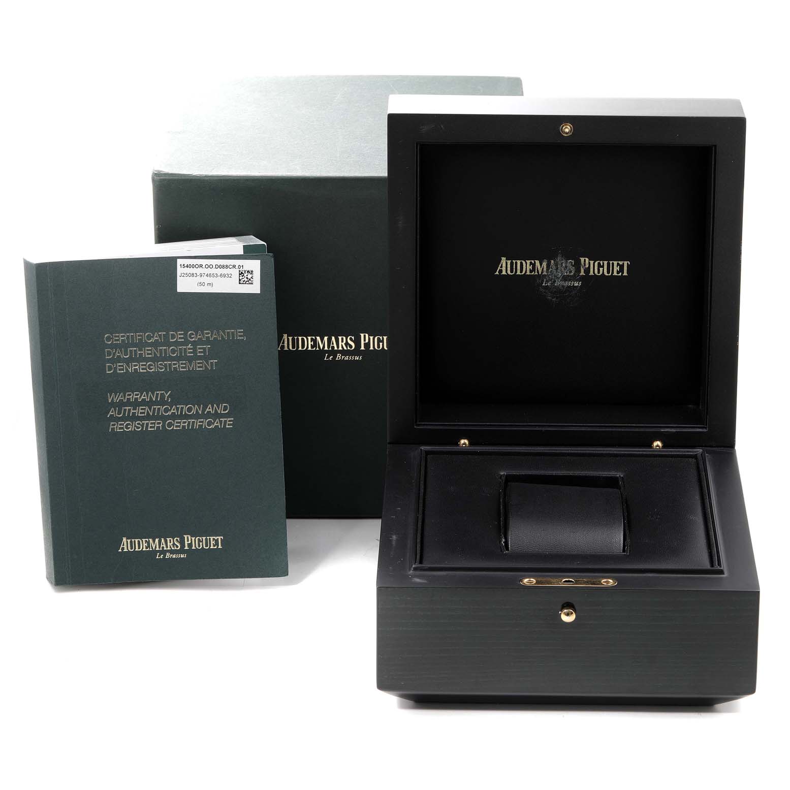 The image shows the packaging and warranty certificate for the Royal Oak model by Audemars Piguet.