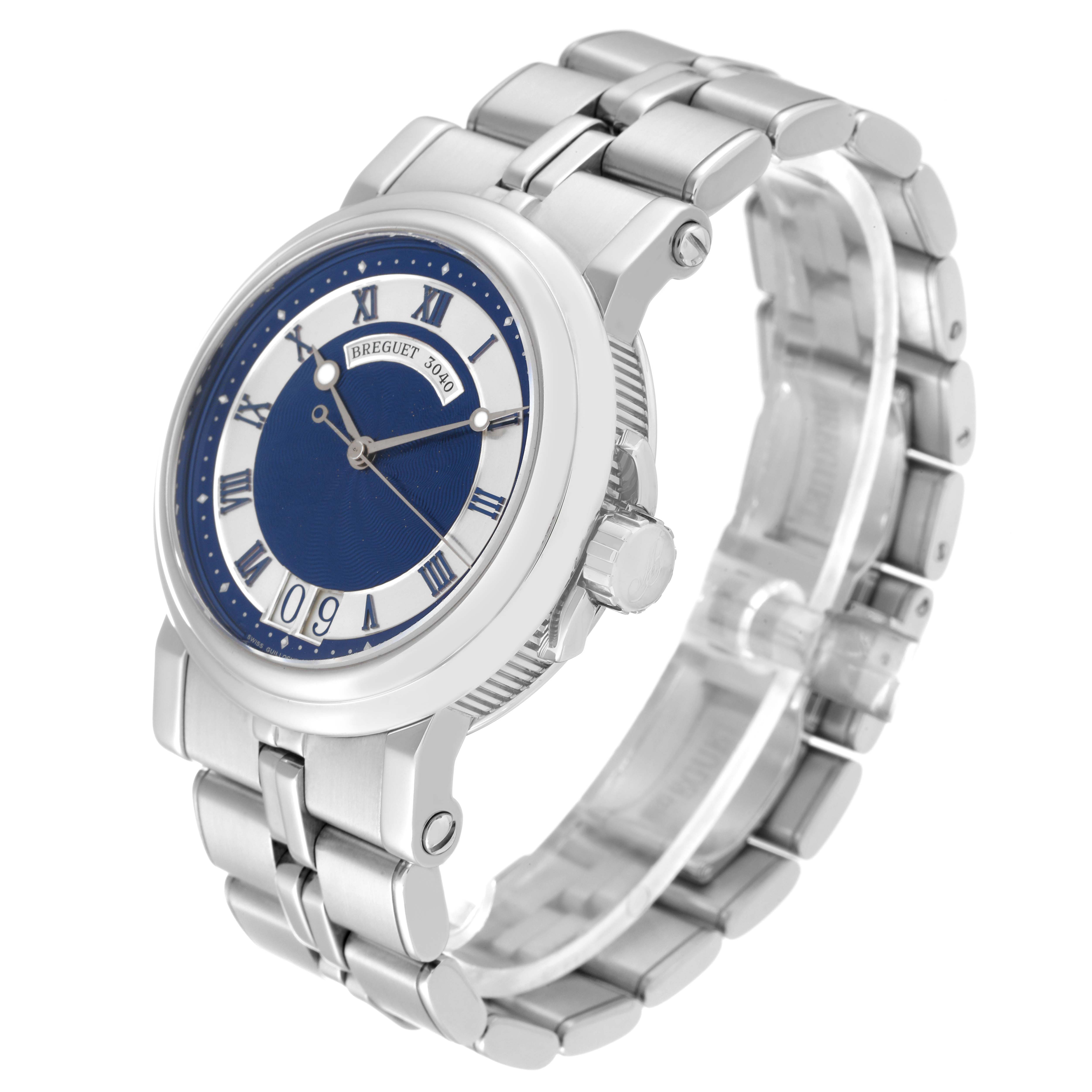 The Marine model by Breguet is shown at a three-quarter angle, highlighting its dial, case, and metal bracelet.