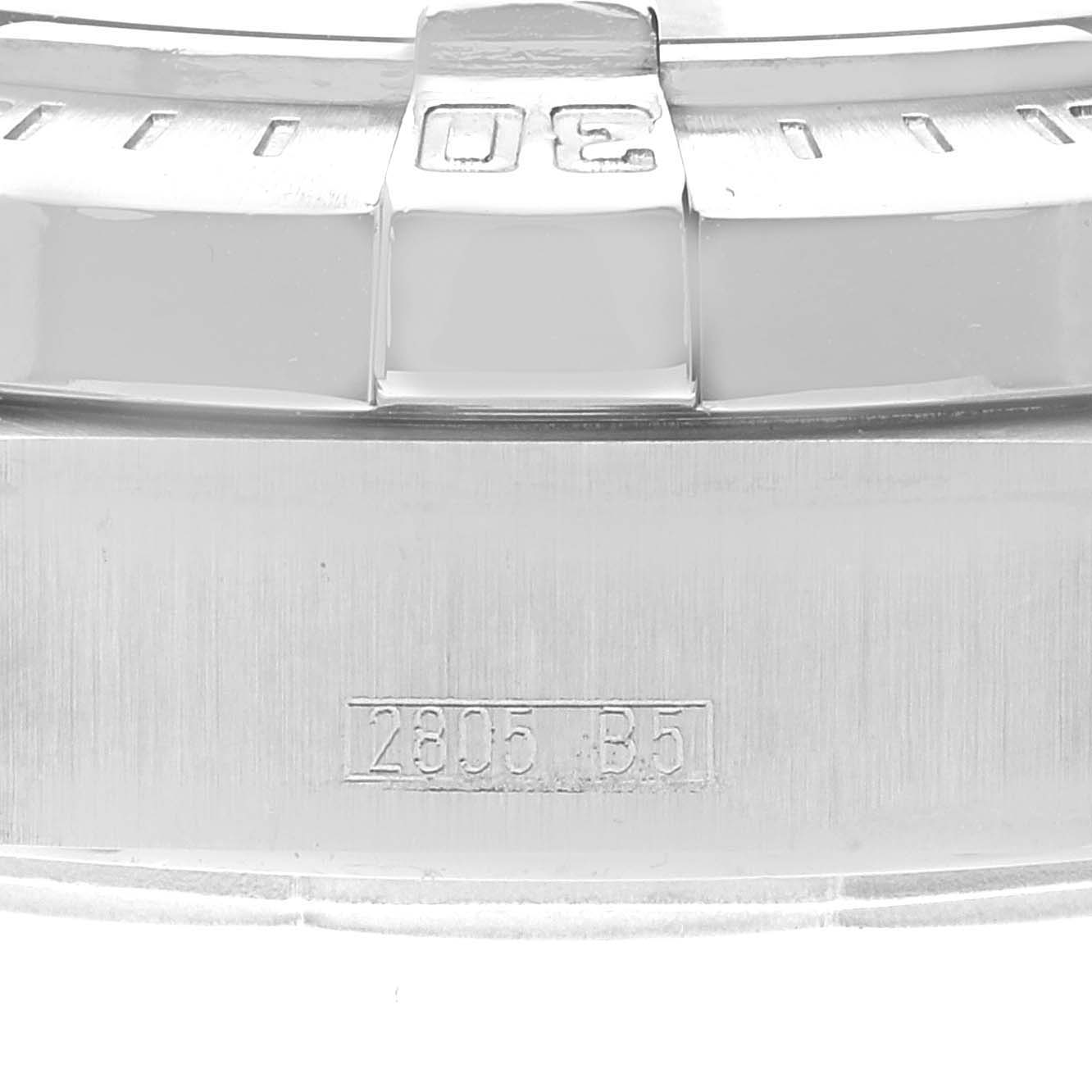 This close-up image shows the bezel and engraved serial number of a Breitling Superocean A17390 Men's Stainless Steel Blue Dial A17390 Men's Stainless Steel Blue Dial watch.