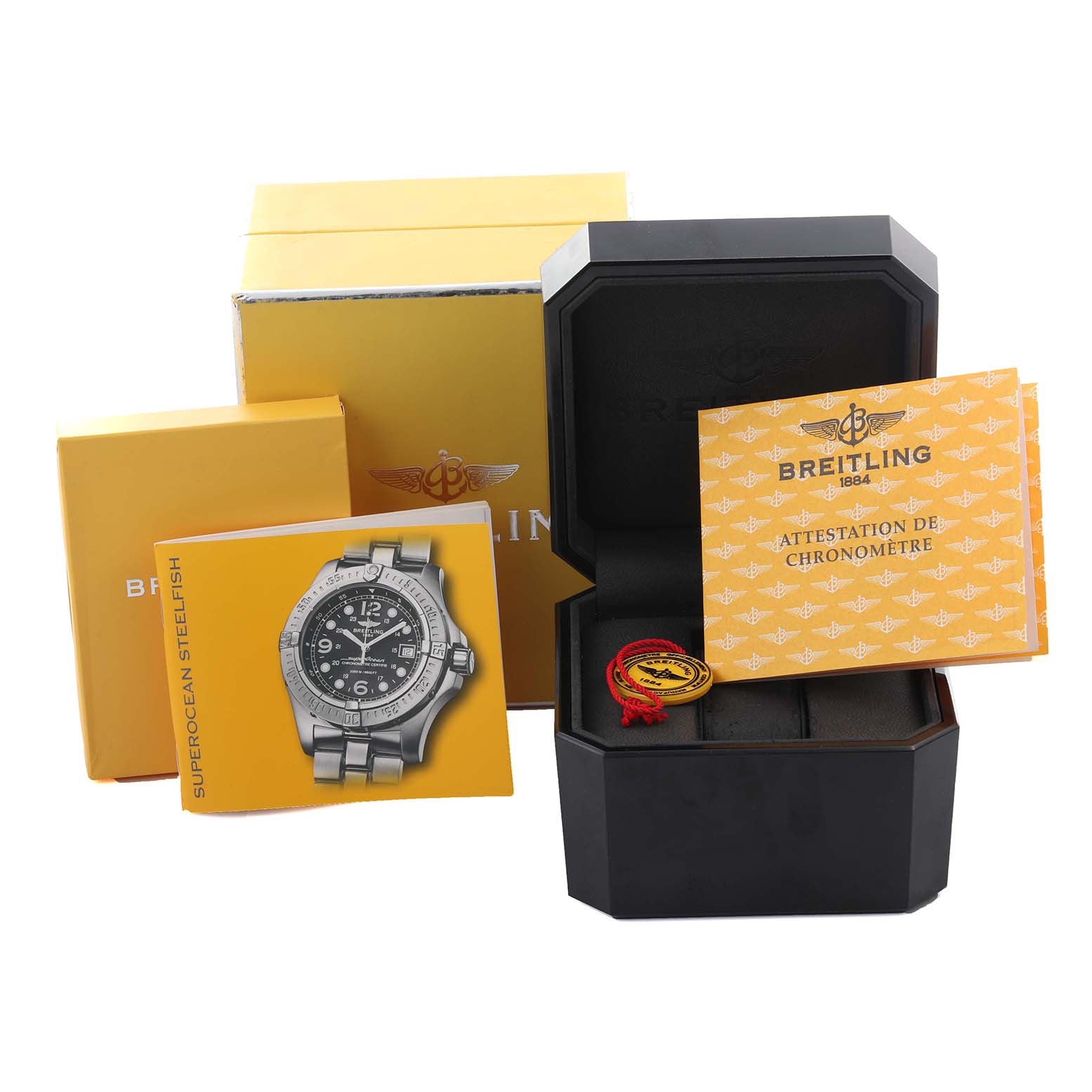 The image shows the Breitling Superocean A1739010/G591-2LT Men
s Stainless Steel Silver Dial A1739010/G591-2LT Men
s Stainless Steel Silver Dial watch box, warranty cards, and manual with no watch visible.