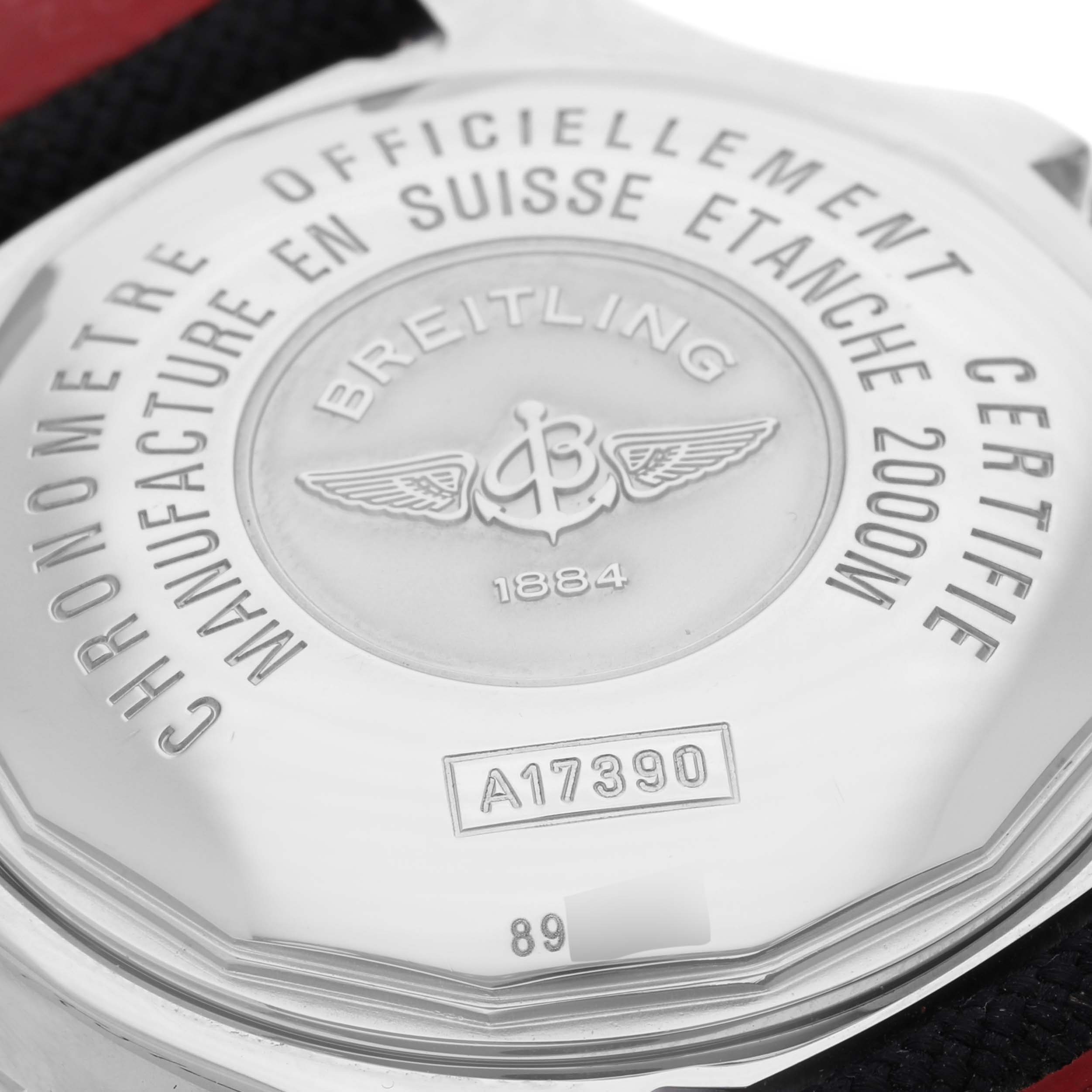 The image shows the case back of a Breitling Superocean A1739010/G591-2LT Men
s Stainless Steel Silver Dial A1739010/G591-2LT Men
s Stainless Steel Silver Dial watch, highlighting its engravings and features.